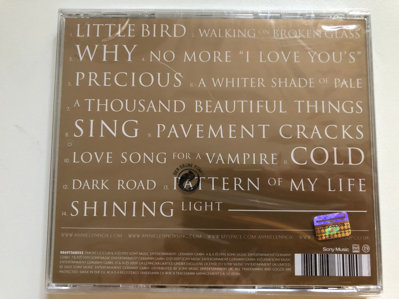 https://cdn10.bigcommerce.com/s-62bdpkt7pb/products/0/images/260965/The_Annie_Lennox_Collection_Includes_Why_Walking_On_Broken_Glass_Sing_Little_Bird_No_More_I_Love_Yous_And_Shining_Light_Sony_Music_Audio_CD_2009_88697368052_2__12217.1671096843.1280.1280.JPG?c=2&_gl=1*45idv3*_ga*MjA2NTIxMjE2MC4xNTkwNTEyNTMy*_ga_WS2VZYPC6G*MTY3MTA5NTYyMi42NzIuMS4xNjcxMDk2NDA0LjI5LjAuMA..