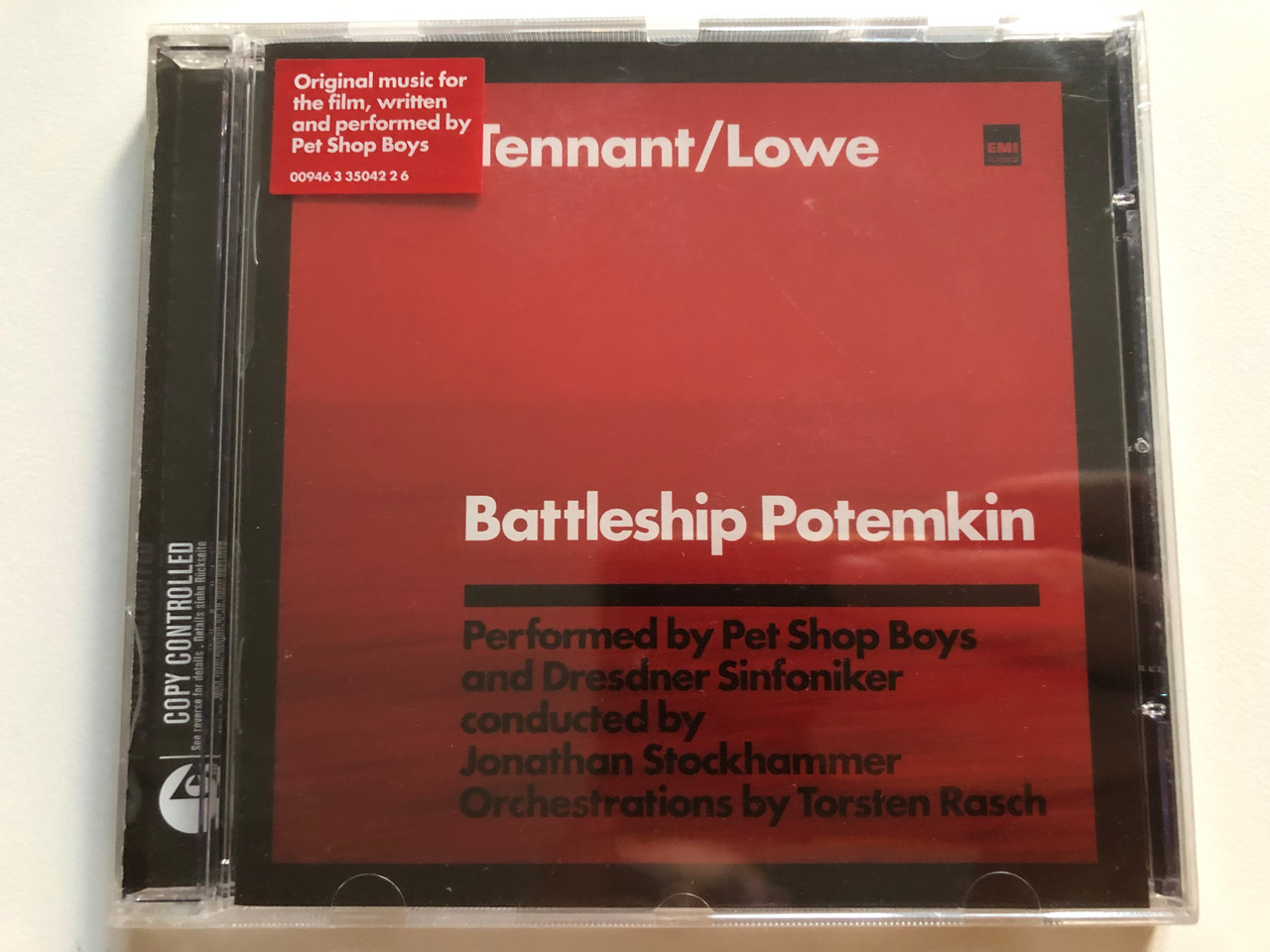 https://cdn10.bigcommerce.com/s-62bdpkt7pb/products/0/images/261059/TennantLowe_Battleship_Potemkin_Performed_by_Pet_Shop_Boys_and_Dresdner_Sinfoniker_conducted_by_Jonathan_Stockhammer_Orchestrations_by_Torsten_Rasch_Parlophone_Audio_CD_2005_00946335042_1__22481.1671202840.1280.1280.JPG?c=2&_gl=1*1gs1s45*_ga*MjA2NTIxMjE2MC4xNTkwNTEyNTMy*_ga_WS2VZYPC6G*MTY3MTE5OTEwOC42NzQuMS4xNjcxMjAyNjQ1LjU2LjAuMA..