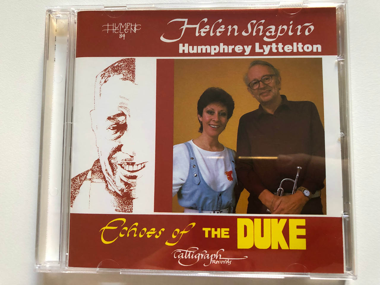 https://cdn10.bigcommerce.com/s-62bdpkt7pb/products/0/images/261480/Helen_Shapiro_Humphrey_Lyttelton_Echoes_Of_The_Duke_Calligraph_Records_Audio_CD_1985_CLGCD_002_1__13831.1671478738.1280.1280.JPG?c=2&_gl=1*1buz28d*_ga*MjA2NTIxMjE2MC4xNTkwNTEyNTMy*_ga_WS2VZYPC6G*MTY3MTQ2ODAyNS42NzYuMS4xNjcxNDc4NDA4LjU3LjAuMA..