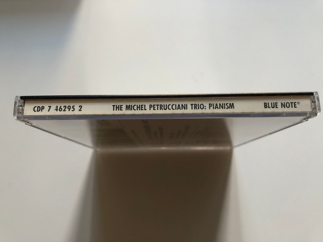 https://cdn10.bigcommerce.com/s-62bdpkt7pb/products/0/images/261500/The_Michel_Petrucciani_Trio_Pianism_Blue_Note_Audio_CD_1985_CDP_7_46295_2_3__00404.1671532310.1280.1280.JPG?c=2&_gl=1*1vefexb*_ga*MjA2NTIxMjE2MC4xNTkwNTEyNTMy*_ga_WS2VZYPC6G*MTY3MTUyOTIzOC42NzcuMS4xNjcxNTMyMjY1LjYwLjAuMA..