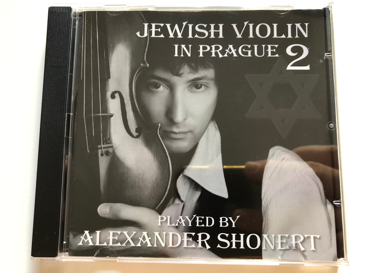 https://cdn10.bigcommerce.com/s-62bdpkt7pb/products/0/images/261639/Jewish_Violin_In_Prague_2_-_Played_By_Alexander_Shonert_Faust_Records_Audio_CD_2009_FR_34-2331_1__56709.1671649187.1280.1280.JPG?c=2&_gl=1*12i0vsf*_ga*MjA2NTIxMjE2MC4xNTkwNTEyNTMy*_ga_WS2VZYPC6G*MTY3MTY0NzQ4MC42ODEuMS4xNjcxNjQ5MTkwLjYwLjAuMA..