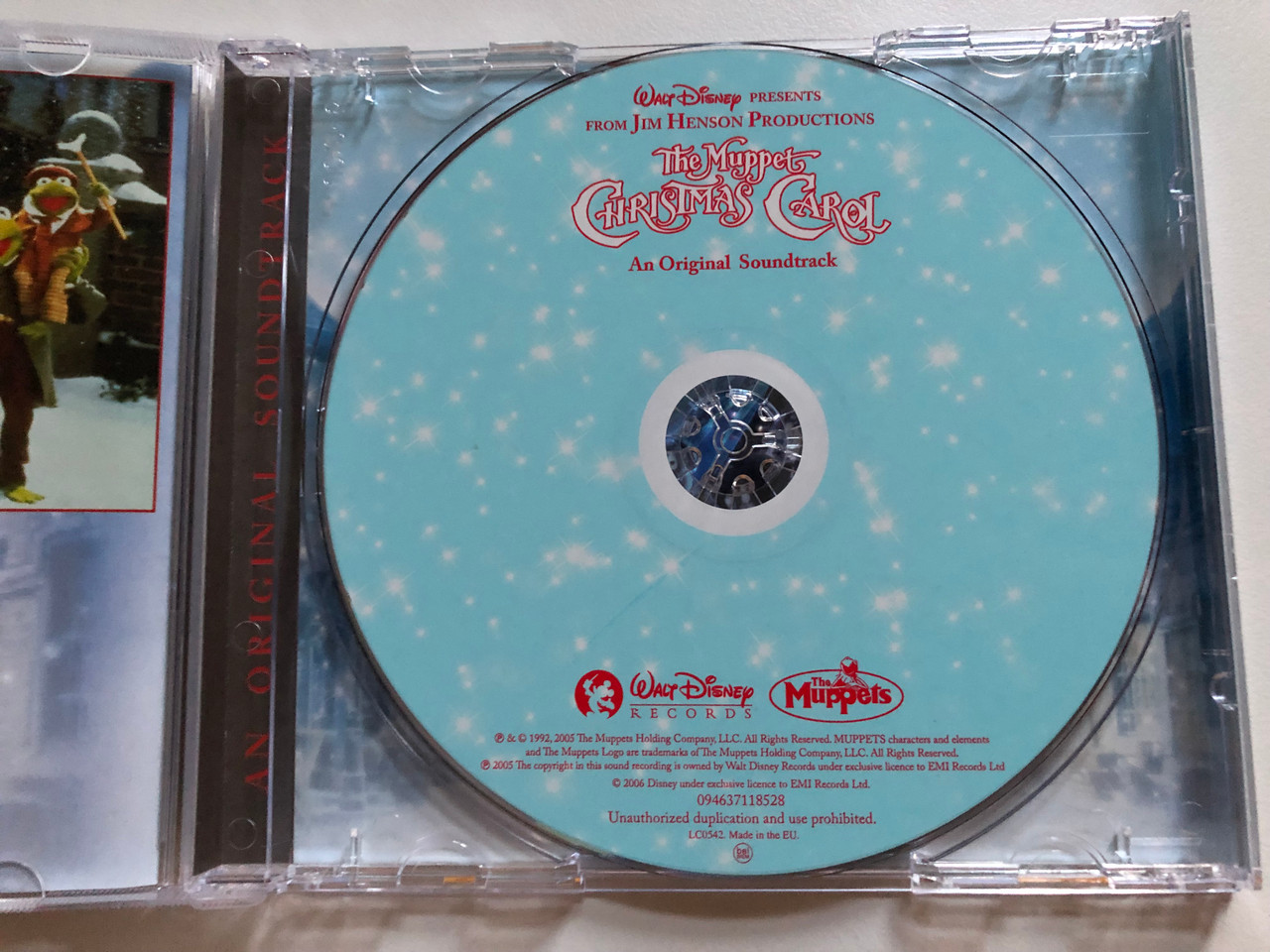 https://cdn10.bigcommerce.com/s-62bdpkt7pb/products/0/images/261738/The_Muppet_Christmas_Carol_-_Special_Anniversary_Edition_Celebrating_50_Years_of_Bein_Green_Walt_Disney_Pictures_Presents_From_Jim_Henson_Productions_Walt_Disney_Records_Audio_CD_2006_3__62742.1671703740.1280.1280.JPG?c=2&_gl=1*29xbes*_ga*MjA2NTIxMjE2MC4xNTkwNTEyNTMy*_ga_WS2VZYPC6G*MTY3MTY5NjU5Ny42ODIuMS4xNjcxNzAzNjc1LjYwLjAuMA..