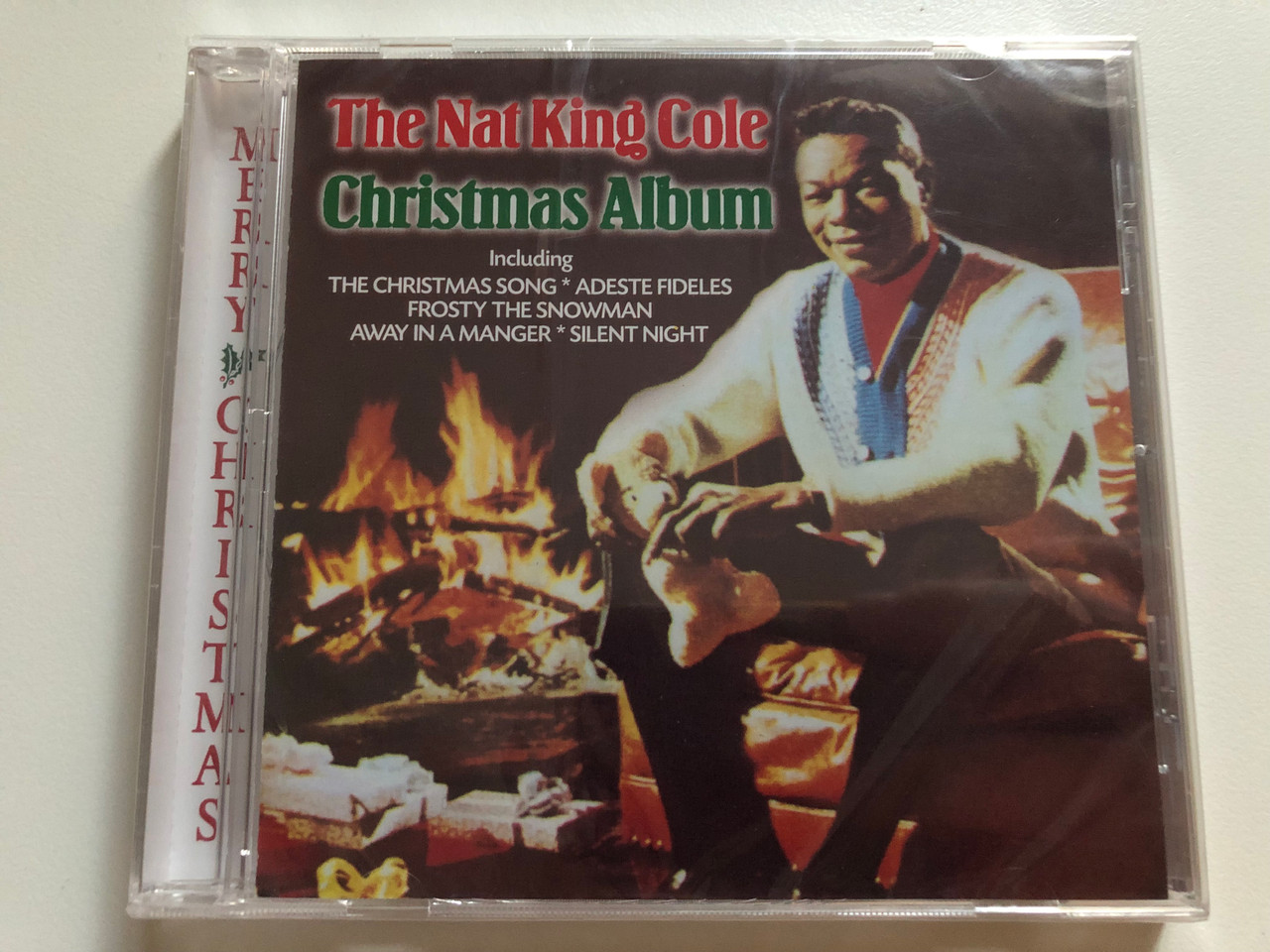 https://cdn10.bigcommerce.com/s-62bdpkt7pb/products/0/images/261759/The_Nat_King_Cole_Christmas_Album_Including_The_Christmas_Song_Adeste_Fideles_Frosty_The_Snowman_Away_In_A_Manger_Silent_Night_EMI_Audio_CD_1998_724349684225_1__58941.1671708344.1280.1280.JPG?c=2&_gl=1*17gv3xf*_ga*MjA2NTIxMjE2MC4xNTkwNTEyNTMy*_ga_WS2VZYPC6G*MTY3MTcwODE4MC42ODMuMC4xNjcxNzA4MTgwLjYwLjAuMA..