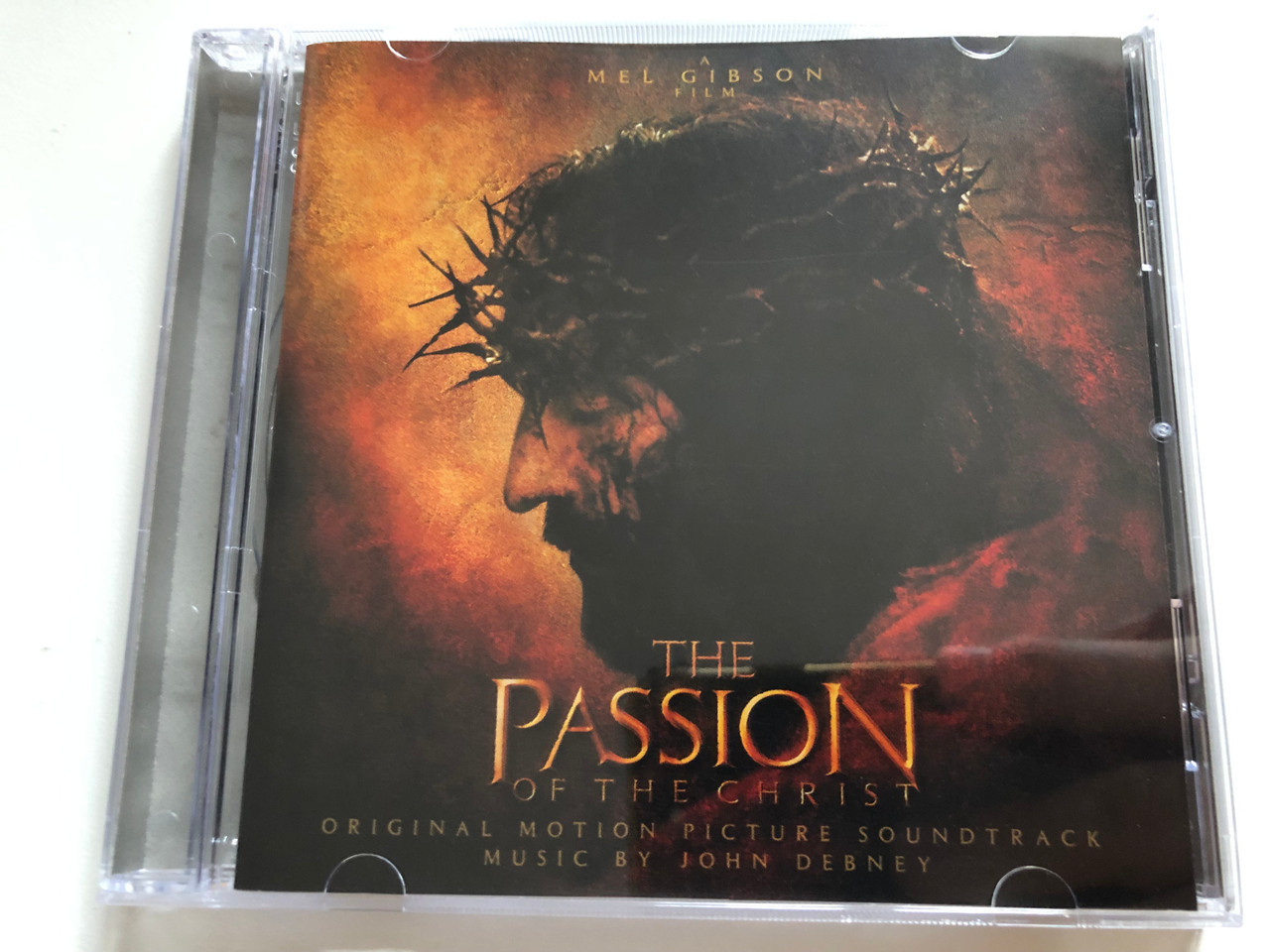 https://cdn10.bigcommerce.com/s-62bdpkt7pb/products/0/images/261957/The_Passion_Of_The_Christ_A_Mel_Gibson_Film_-_Original_Motion_Picture_Soundtrack_Music_By_John_Debney_Sony_Classical_Audio_CD_2004_SK_92046_1__27441.1671789220.1280.1280.JPG?c=2&_gl=1*v1sft3*_ga*MjA2NTIxMjE2MC4xNTkwNTEyNTMy*_ga_WS2VZYPC6G*MTY3MTc4MTY4Mi42ODUuMS4xNjcxNzg5MDMxLjUxLjAuMA..