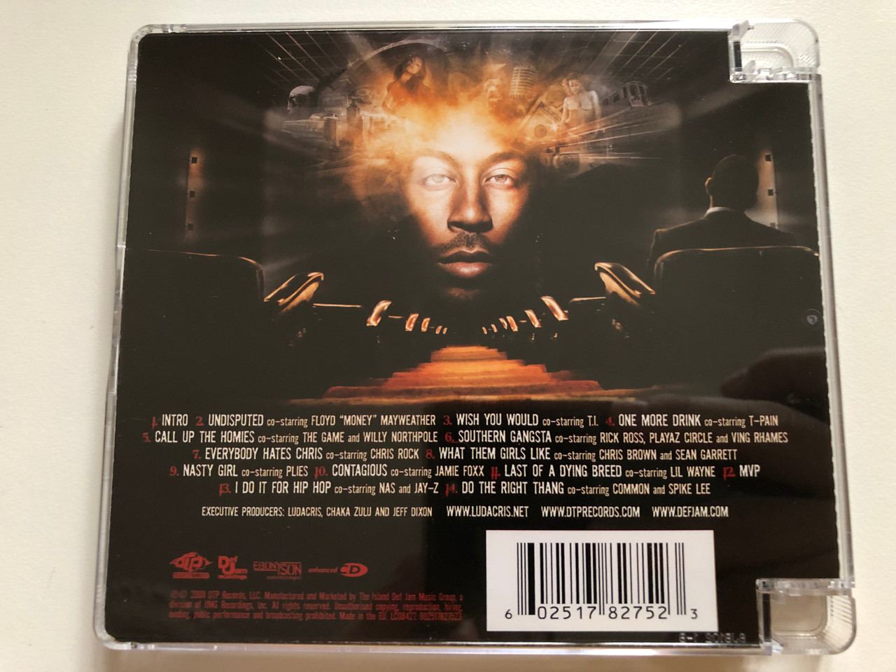https://cdn10.bigcommerce.com/s-62bdpkt7pb/products/0/images/262020/Ludacris_Theater_Of_The_Mind_Disturbing_Tha_Peace_Audio_CD_2008_602517827523_2__04453.1672035332.1280.1280.JPG?c=2&_gl=1*fvijgw*_ga*MjA2NTIxMjE2MC4xNTkwNTEyNTMy*_ga_WS2VZYPC6G*MTY3MjAzNTE3OC42ODYuMC4xNjcyMDM1MTc4LjYwLjAuMA..