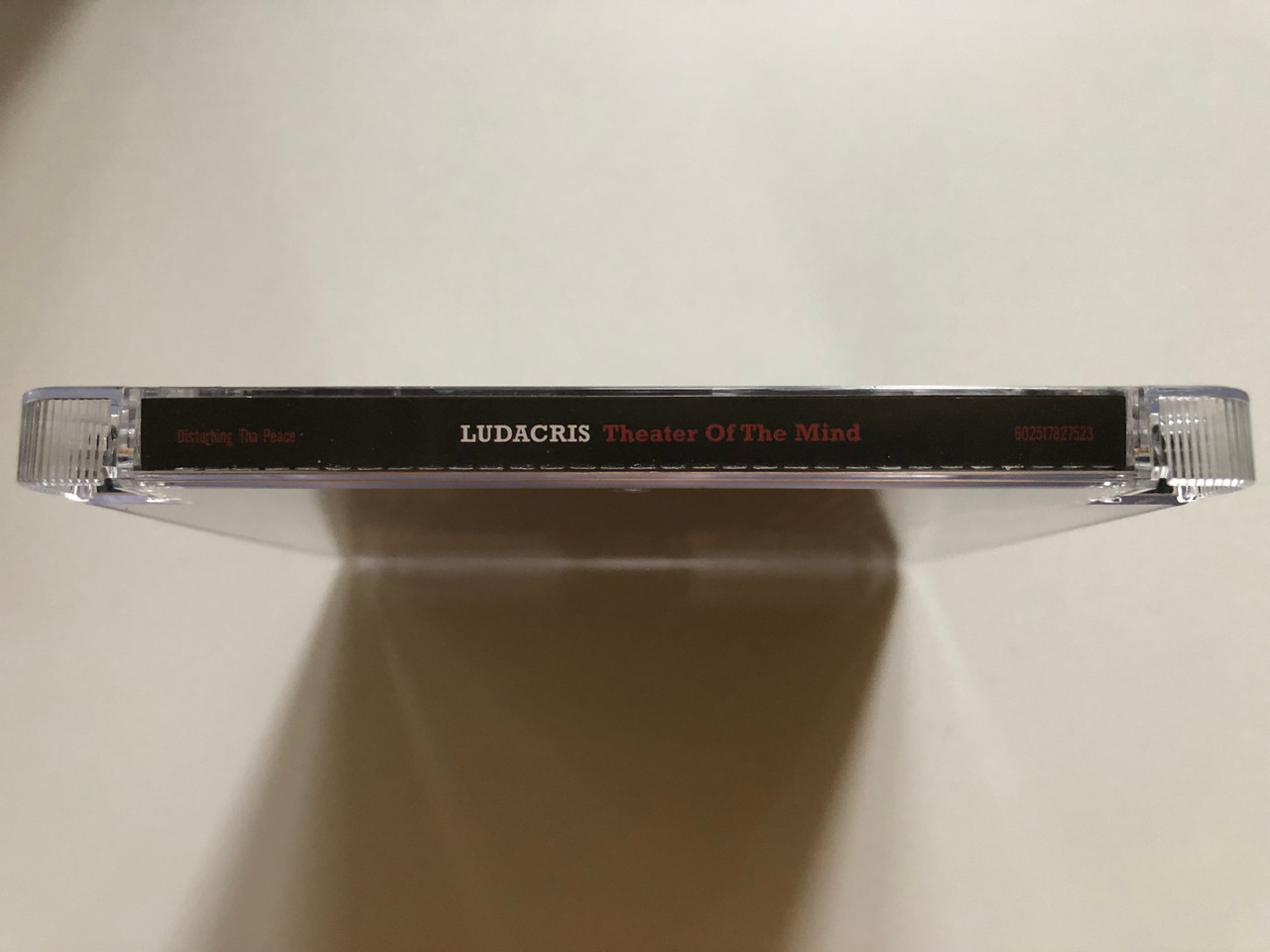 https://cdn10.bigcommerce.com/s-62bdpkt7pb/products/0/images/262021/Ludacris_Theater_Of_The_Mind_Disturbing_Tha_Peace_Audio_CD_2008_602517827523_3__17547.1672035338.1280.1280.JPG?c=2&_gl=1*fvijgw*_ga*MjA2NTIxMjE2MC4xNTkwNTEyNTMy*_ga_WS2VZYPC6G*MTY3MjAzNTE3OC42ODYuMC4xNjcyMDM1MTc4LjYwLjAuMA..