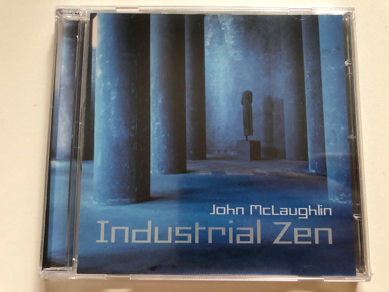 https://cdn10.bigcommerce.com/s-62bdpkt7pb/products/0/images/262083/John_McLaughlin_Industrial_Zen_Universal_Music_Jazz_France_Audio_CD_2006_0602498393284_1__02497.1672048654.1280.1280.JPG?c=2&_gl=1*b7nsns*_ga*MjA2NTIxMjE2MC4xNTkwNTEyNTMy*_ga_WS2VZYPC6G*MTY3MjAzNTE3OC42ODYuMS4xNjcyMDQ4NjczLjYwLjAuMA..