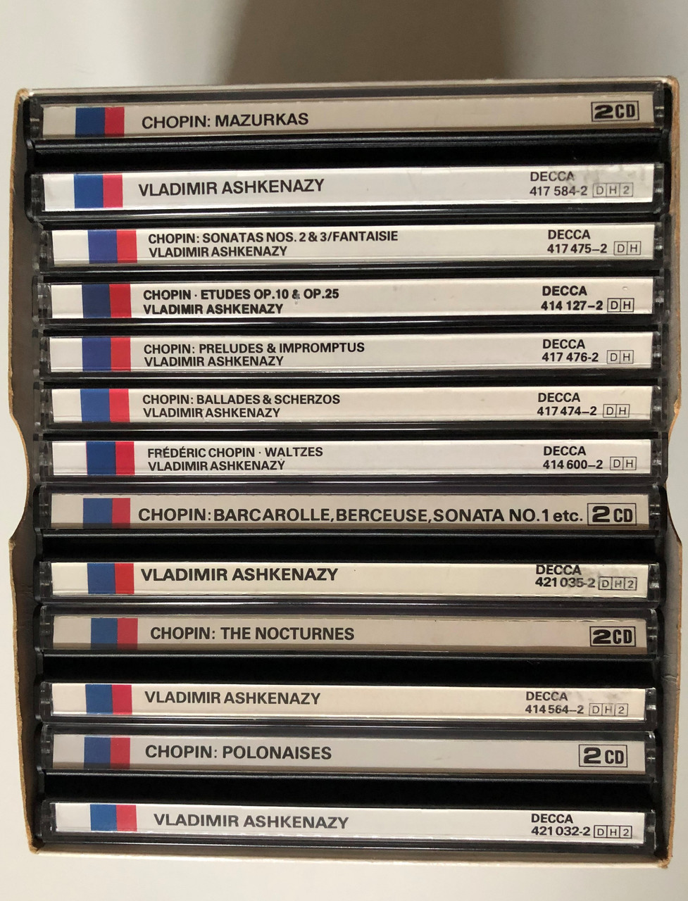 https://cdn10.bigcommerce.com/s-62bdpkt7pb/products/0/images/262545/Chopin_Works_For_Solo_Piano_-_Vladimir_Ashkenazy_Decca_13x_Audio_CD_Box_Set_421_185-2_2__13433.1672310569.1280.1280.JPG?c=2&_gl=1*1tziika*_ga*MjA2NTIxMjE2MC4xNTkwNTEyNTMy*_ga_WS2VZYPC6G*MTY3MjMwNDc3MC42OTIuMS4xNjcyMzEwNjczLjYwLjAuMA..