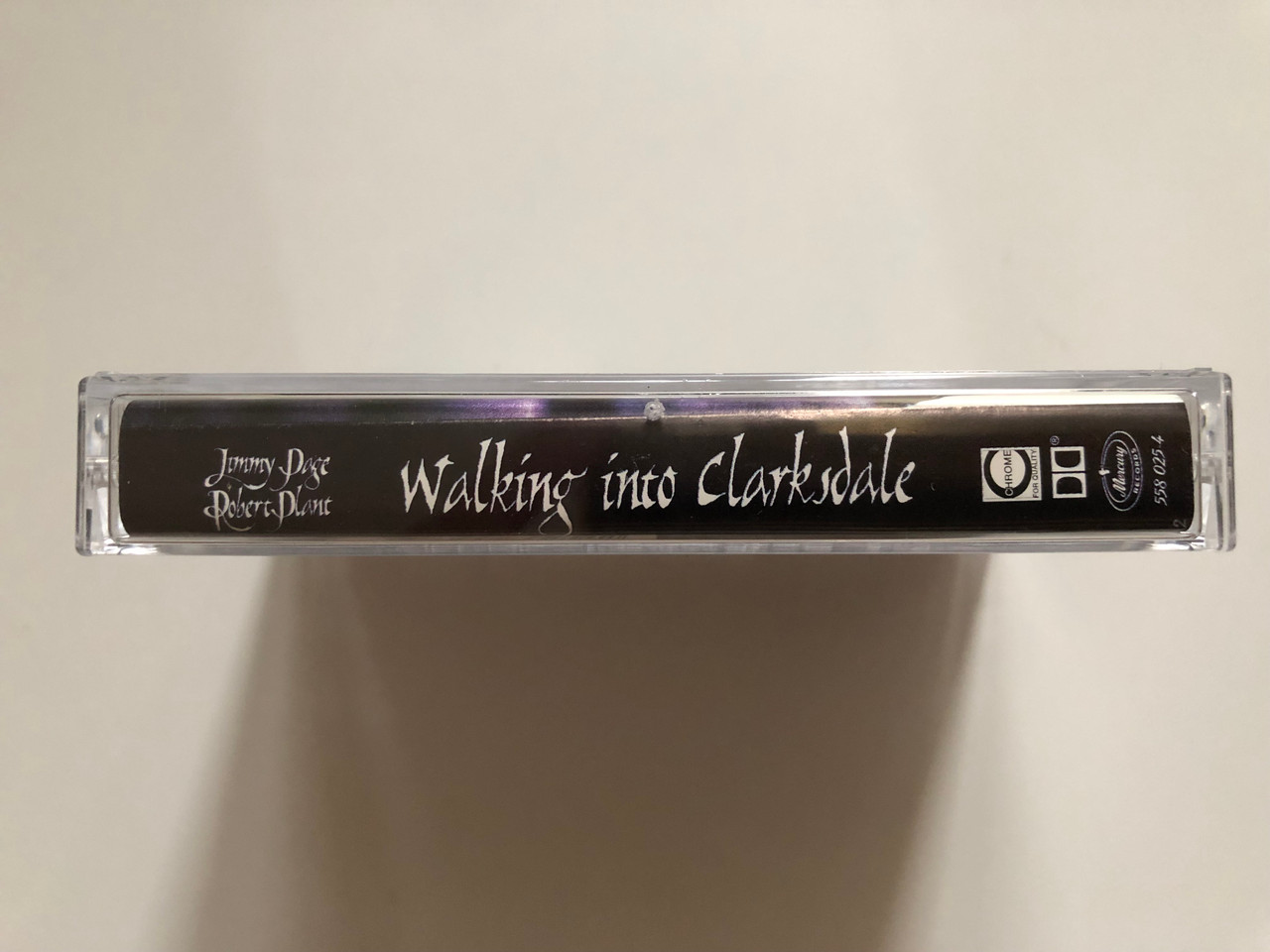 https://cdn10.bigcommerce.com/s-62bdpkt7pb/products/0/images/262736/Jimmy_Page_Robert_Plant_Walking_Into_Clarksdale_Mercury_Audio_Cassette_1998_558_025-4_3__61834.1672387295.1280.1280.JPG?c=2&_gl=1*1ydtqnp*_ga*MjA2NTIxMjE2MC4xNTkwNTEyNTMy*_ga_WS2VZYPC6G*MTY3MjM3NjIxMS42OTMuMS4xNjcyMzg3Mjg3LjYwLjAuMA..