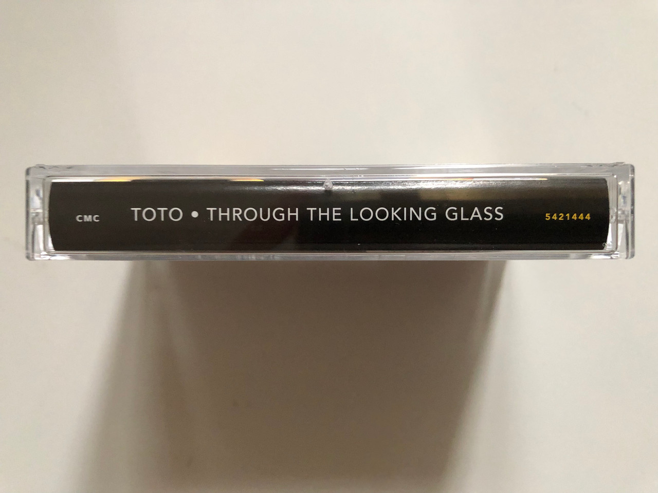 https://cdn10.bigcommerce.com/s-62bdpkt7pb/products/0/images/262749/Toto_Through_The_Looking_Glass_CMC_Audio_Cassette_5421444_3__42563.1672388658.1280.1280.JPG?c=2&_gl=1*13wrav4*_ga*MjA2NTIxMjE2MC4xNTkwNTEyNTMy*_ga_WS2VZYPC6G*MTY3MjM3NjIxMS42OTMuMS4xNjcyMzg4NjQ1LjYwLjAuMA..