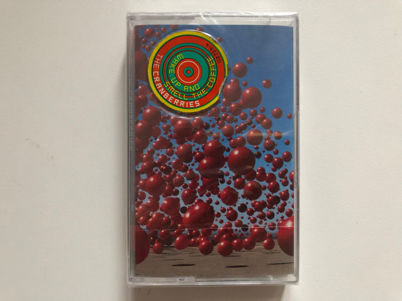 https://cdn10.bigcommerce.com/s-62bdpkt7pb/products/0/images/262830/The_Cranberries_Wake_Up_And_Smell_The_Coffee_MCA_Records_Audio_Cassette_2001_112_739-4_1__49199.1672649969.1280.1280.JPG?c=2&_gl=1*1fxd4mz*_ga*MjA2NTIxMjE2MC4xNTkwNTEyNTMy*_ga_WS2VZYPC6G*MTY3MjY0MTAyNS42OTQuMS4xNjcyNjQ5ODE2LjQyLjAuMA..