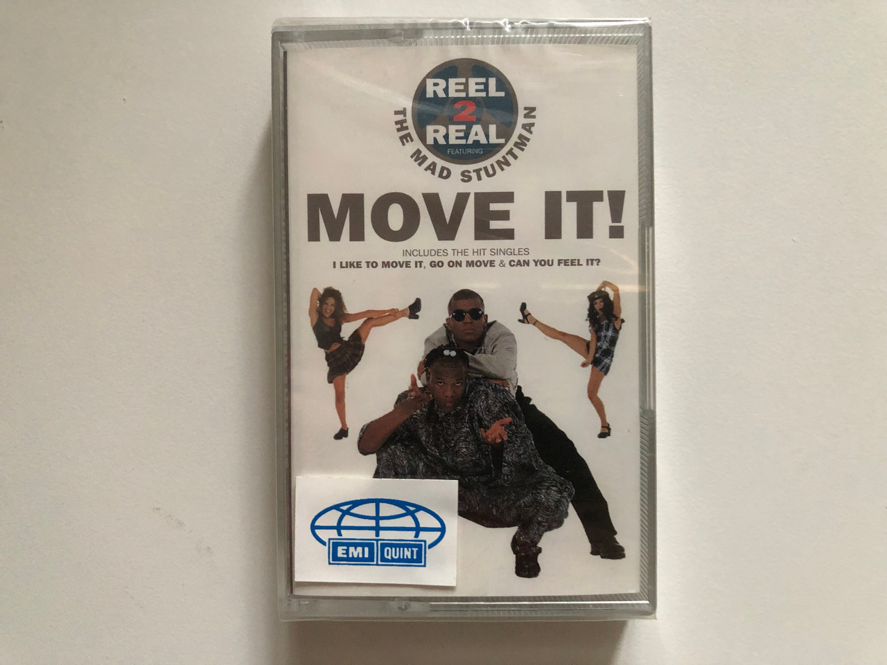 https://cdn10.bigcommerce.com/s-62bdpkt7pb/products/0/images/262836/Reel_2_Real_The_Mad_Stuntman_Move_It_Includes_The_Hit_Singles_I_Like_To_Move_It_Go_On_Move_Can_You_Feel_It_Positiva_Audio_Cassette_1994_724383096541_1__49207.1672650754.1280.1280.JPG?c=2&_gl=1*19uk8xo*_ga*MjA2NTIxMjE2MC4xNTkwNTEyNTMy*_ga_WS2VZYPC6G*MTY3MjY0MTAyNS42OTQuMS4xNjcyNjUwNTA0LjQ4LjAuMA..