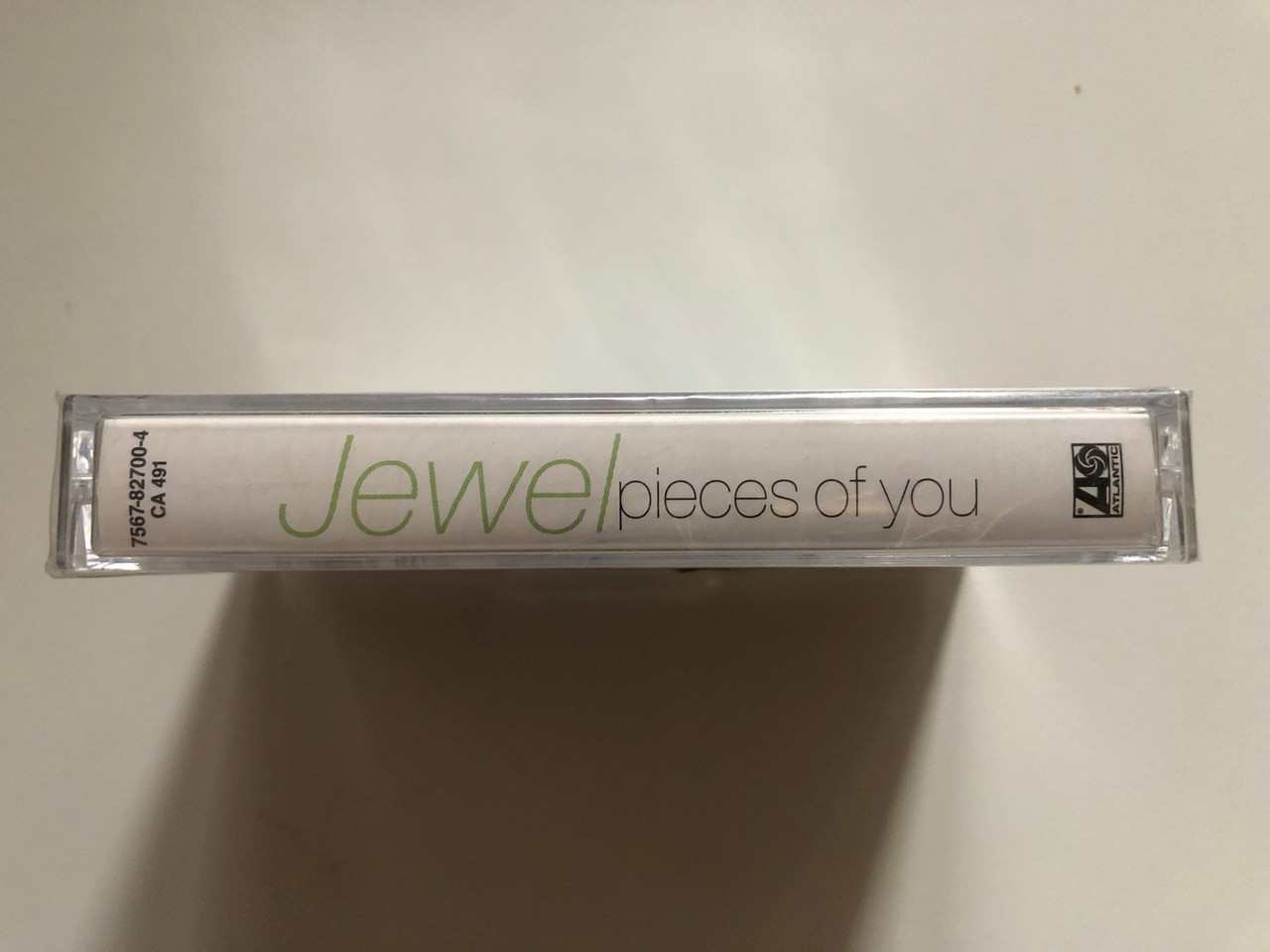 https://cdn10.bigcommerce.com/s-62bdpkt7pb/products/0/images/262850/Jewel_Pieces_Of_You_What_We_Call_Human_Nature_In_Actuality_Is_Human_Habit_Atlantic_Audio_Cassette_1994_7567-82700-4_3__34599.1672653579.1280.1280.JPG?c=2&_gl=1*1cculqm*_ga*MjA2NTIxMjE2MC4xNTkwNTEyNTMy*_ga_WS2VZYPC6G*MTY3MjY0MTAyNS42OTQuMS4xNjcyNjUzMjM3LjYwLjAuMA..