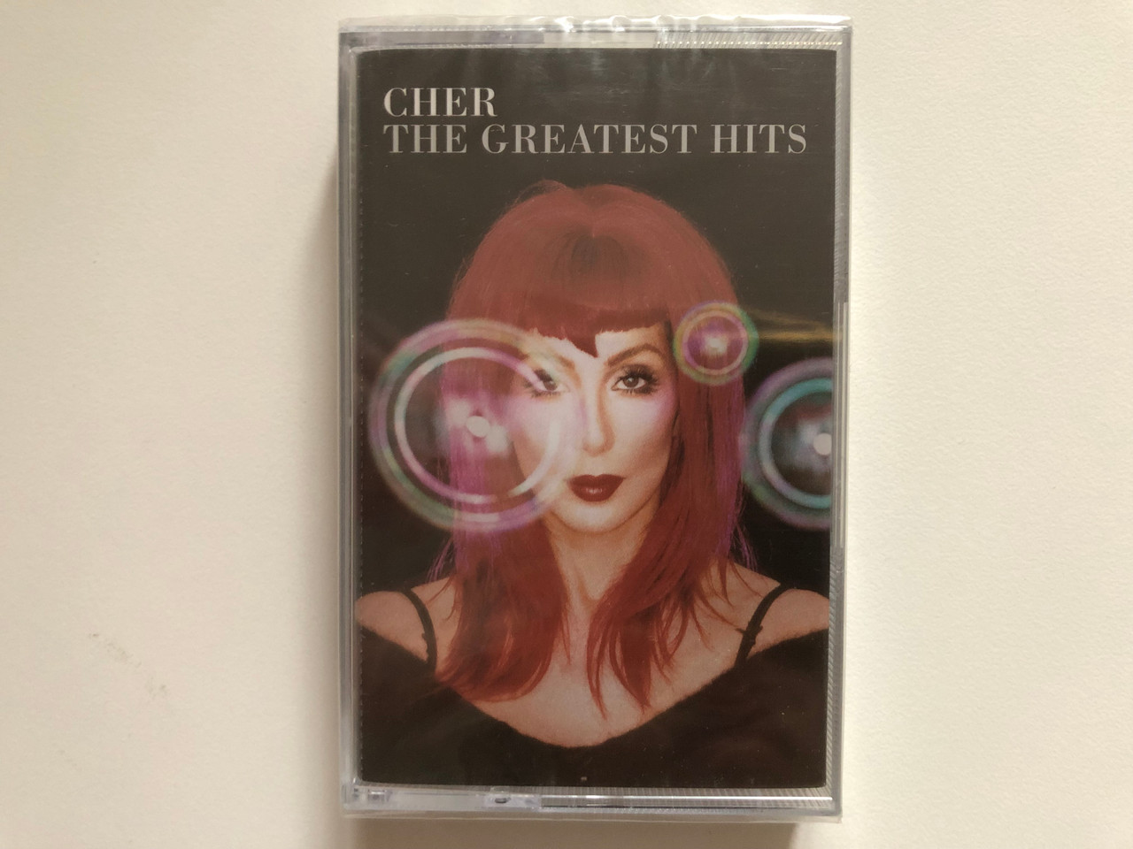 https://cdn10.bigcommerce.com/s-62bdpkt7pb/products/0/images/262903/Cher_The_Greatest_Hits_WEA_Audio_Cassette_8573_804_204_1__76210.1672740589.1280.1280.JPG?c=2&_gl=1*142hgmw*_ga*MjA2NTIxMjE2MC4xNTkwNTEyNTMy*_ga_WS2VZYPC6G*MTY3Mjc0MDU0Ni42OTYuMC4xNjcyNzQwNTQ2LjYwLjAuMA..