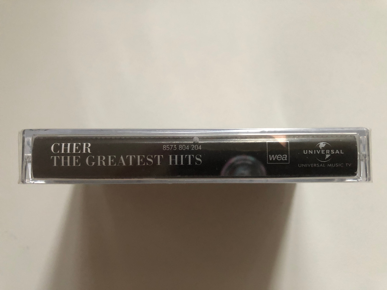 https://cdn10.bigcommerce.com/s-62bdpkt7pb/products/0/images/262904/Cher_The_Greatest_Hits_WEA_Audio_Cassette_8573_804_204_3__87434.1672740590.1280.1280.JPG?c=2&_gl=1*142hgmw*_ga*MjA2NTIxMjE2MC4xNTkwNTEyNTMy*_ga_WS2VZYPC6G*MTY3Mjc0MDU0Ni42OTYuMC4xNjcyNzQwNTQ2LjYwLjAuMA..