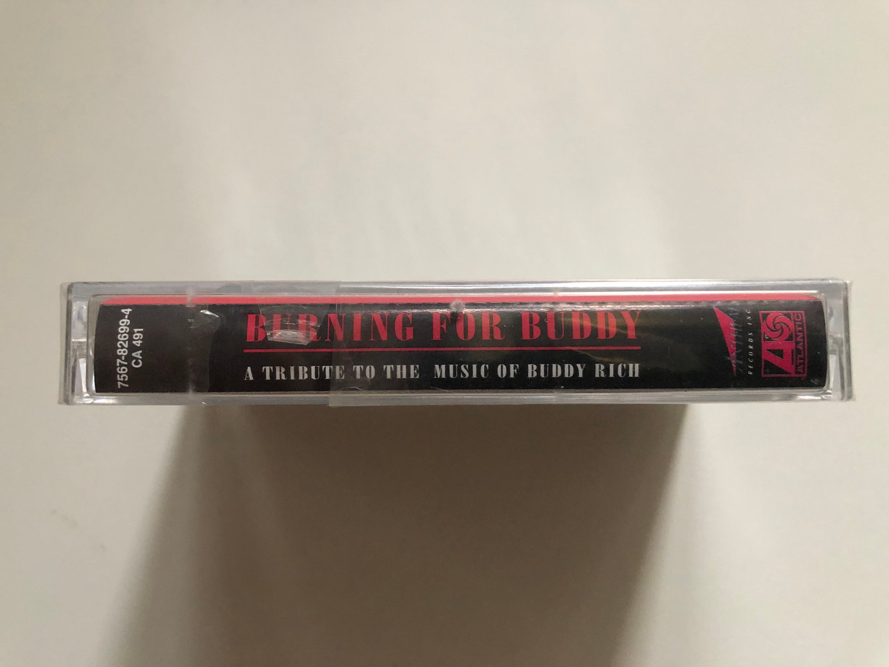 https://cdn10.bigcommerce.com/s-62bdpkt7pb/products/0/images/262917/Burning_For_Buddy_-_A_Tribute_To_The_Music_Of_Buddy_Rich_Atlantic_Audio_Cassette_1994_7567-82699-4_3__34791.1672748538.1280.1280.JPG?c=2&_gl=1*1ayhnys*_ga*MjA2NTIxMjE2MC4xNTkwNTEyNTMy*_ga_WS2VZYPC6G*MTY3Mjc0NzYxNi42OTcuMS4xNjcyNzQ4MTEwLjYwLjAuMA..