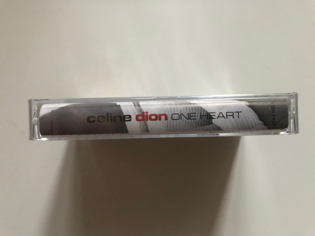 https://cdn10.bigcommerce.com/s-62bdpkt7pb/products/0/images/262936/Celine_Dion_One_Heart_Columbia_Audio_Cassette_2002_5108774000_3__50865.1672751807.1280.1280.JPG?c=2&_gl=1*12o539i*_ga*MjA2NTIxMjE2MC4xNTkwNTEyNTMy*_ga_WS2VZYPC6G*MTY3Mjc0NzYxNi42OTcuMS4xNjcyNzUxNTUzLjM4LjAuMA..