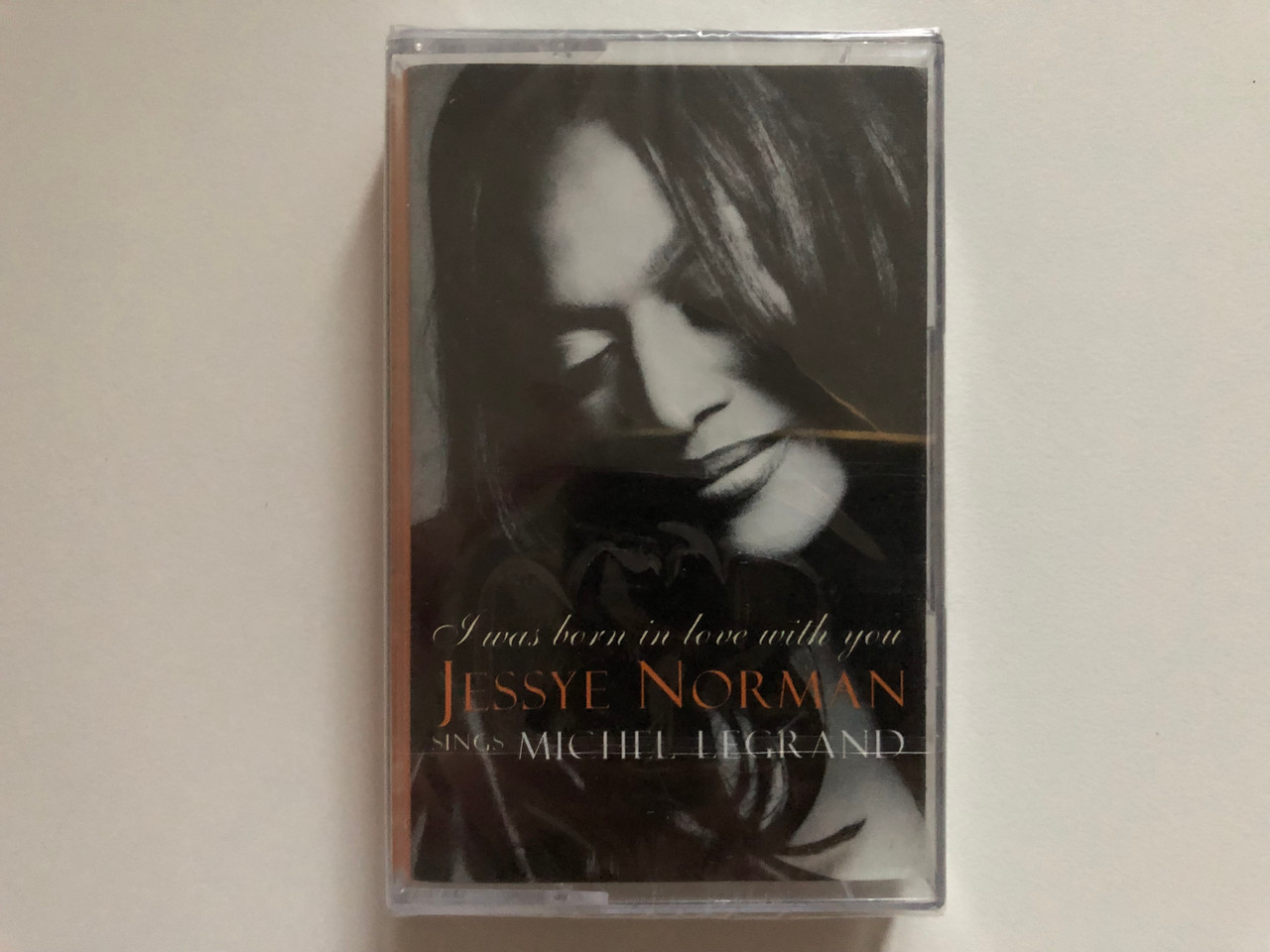 https://cdn10.bigcommerce.com/s-62bdpkt7pb/products/0/images/262985/I_Was_Born_In_Love_With_You_-_Jessye_Norman_Sings_Michel_Legrand_Philips_Classics_Audio_Cassette_456_654-2_1__63657.1672820185.1280.1280.JPG?c=2&_gl=1*2xoavz*_ga*MjA2NTIxMjE2MC4xNTkwNTEyNTMy*_ga_WS2VZYPC6G*MTY3MjgxNzIzMS42OTguMS4xNjcyODE5OTg2LjYwLjAuMA..