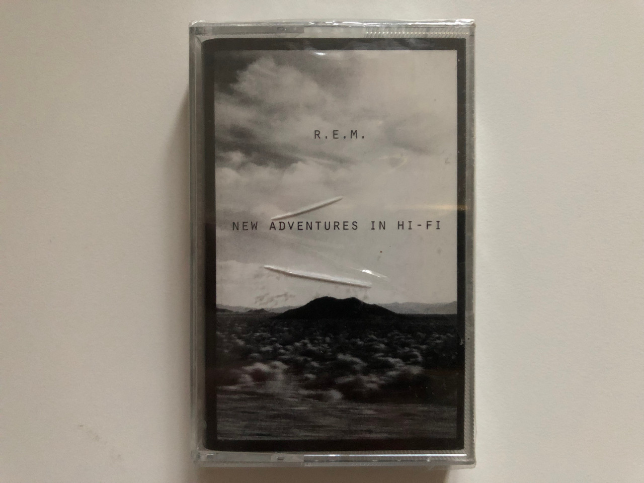 https://cdn10.bigcommerce.com/s-62bdpkt7pb/products/0/images/262993/R.E.M._New_Adventures_In_Hi-Fi_Warner_Music_Poland_Audio_Cassette_9362-46320-4_1__32786.1672821857.1280.1280.JPG?c=2&_gl=1*vrp9o6*_ga*MjA2NTIxMjE2MC4xNTkwNTEyNTMy*_ga_WS2VZYPC6G*MTY3MjgxNzIzMS42OTguMS4xNjcyODIxNzY2LjQ0LjAuMA..