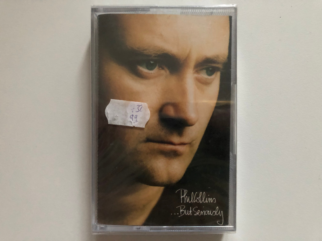 https://cdn10.bigcommerce.com/s-62bdpkt7pb/products/0/images/263022/Phil_Collins_...But_Seriously_WEA_Audio_Cassette_256_984-4_1__74928.1672825902.1280.1280.JPG?c=2&_gl=1*mamww8*_ga*MjA2NTIxMjE2MC4xNTkwNTEyNTMy*_ga_WS2VZYPC6G*MTY3MjgxNzIzMS42OTguMS4xNjcyODI1Njc3LjQ2LjAuMA..
