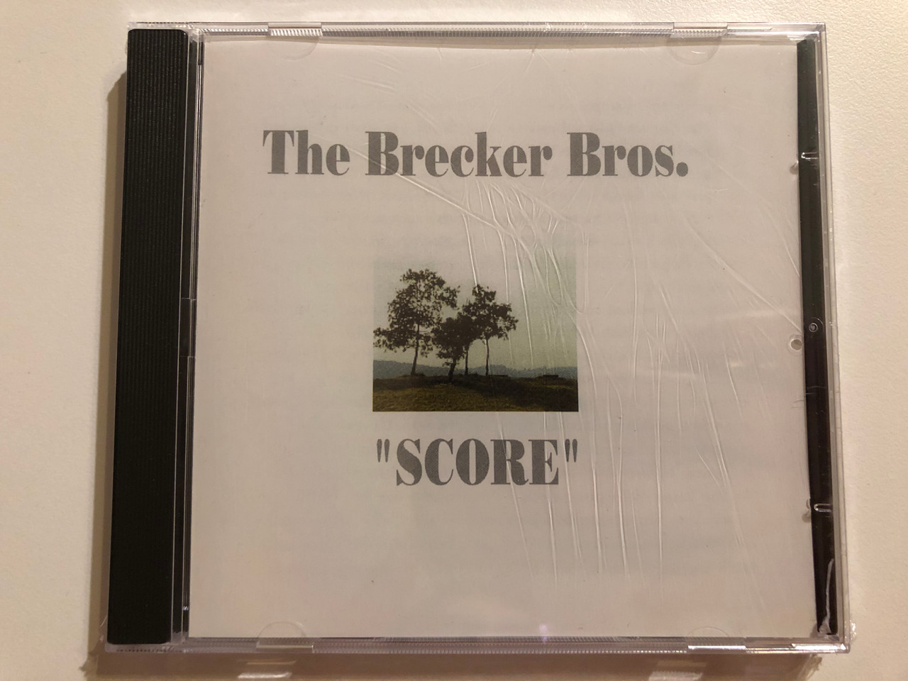 https://cdn10.bigcommerce.com/s-62bdpkt7pb/products/0/images/264300/The_Brecker_Bros._Score_Jazz_Door_Audio_CD_1991_1211_1__53838.1674031086.1280.1280.JPG?c=2&_gl=1*1mkbnal*_ga*MjA2NTIxMjE2MC4xNTkwNTEyNTMy*_ga_WS2VZYPC6G*MTY3NDAzMDkzMi43MTguMS4xNjc0MDMxMDg0LjYwLjAuMA..