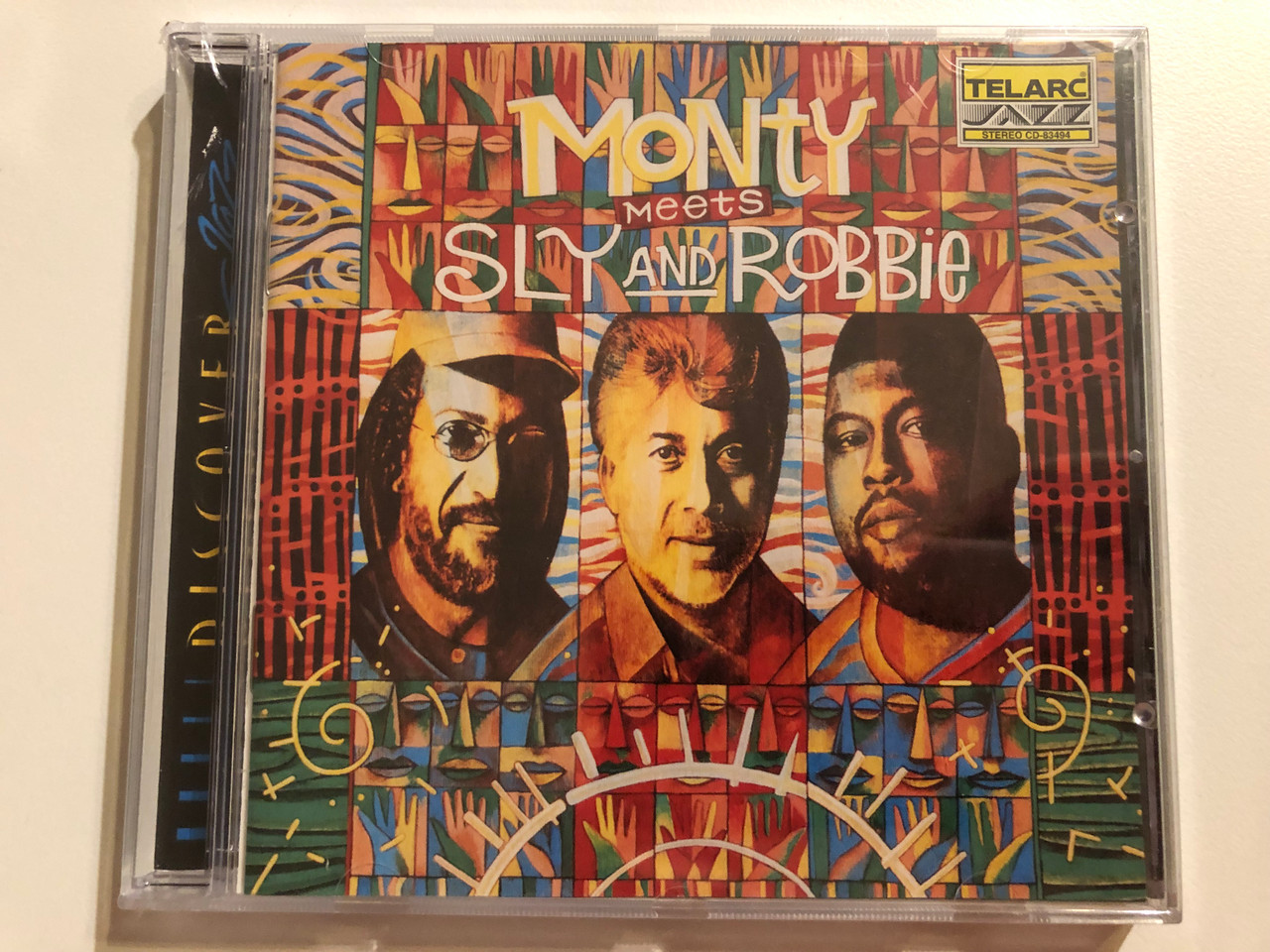 https://cdn10.bigcommerce.com/s-62bdpkt7pb/products/0/images/264313/Monty_Meets_Sly_And_Robbie_Telarc_Audio_CD_2000_CD-83494_1__69779.1674033244.1280.1280.JPG?c=2&_gl=1*157psm7*_ga*MjA2NTIxMjE2MC4xNTkwNTEyNTMy*_ga_WS2VZYPC6G*MTY3NDAzMDkzMi43MTguMS4xNjc0MDMzMTQ4LjU1LjAuMA..