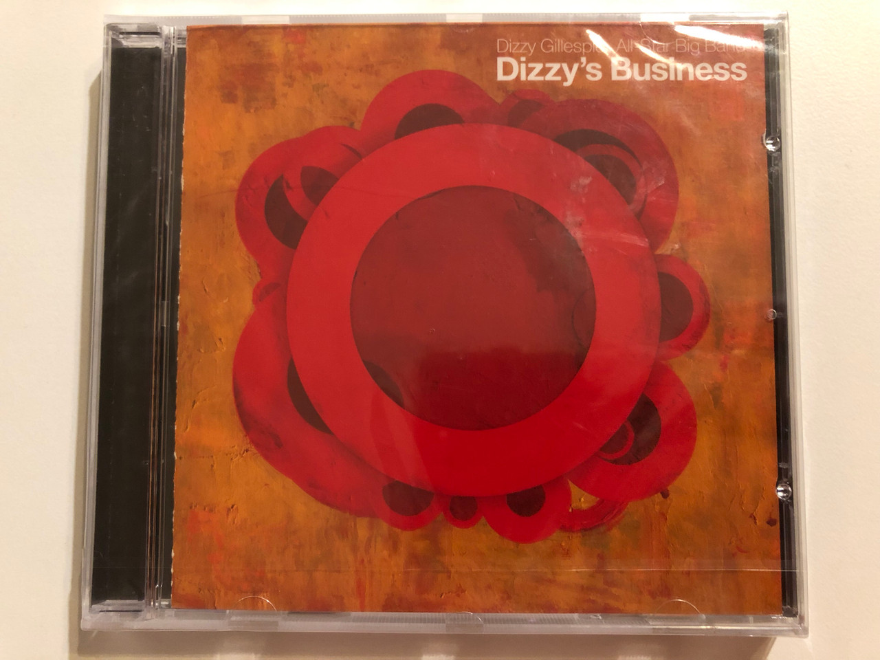 https://cdn10.bigcommerce.com/s-62bdpkt7pb/products/0/images/264469/Dizzy_Gillespie_All-Star_Big_Band_Dizzys_Business_MCG_Jazz_Audio_CD_2005_MCGJ1023_1__70874.1674201503.1280.1280.JPG?c=2&_gl=1*3qjz3o*_ga*MjA2NTIxMjE2MC4xNTkwNTEyNTMy*_ga_WS2VZYPC6G*MTY3NDIwMDIzMi43MjIuMS4xNjc0MjAxMzI2LjUyLjAuMA..