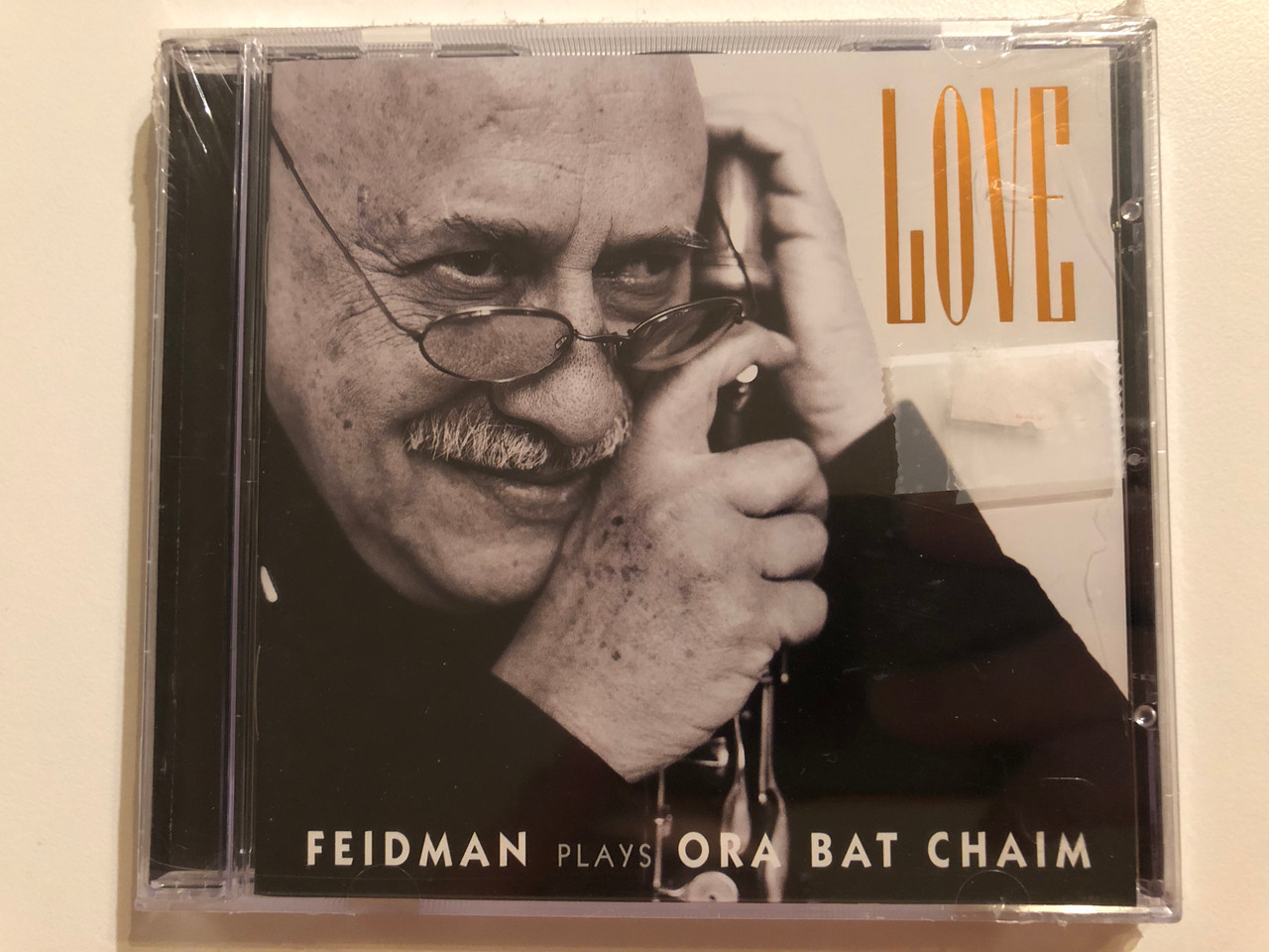 https://cdn10.bigcommerce.com/s-62bdpkt7pb/products/0/images/264512/Love_-_Feidman_Plays_Ora_Bat_Chaim_Warner_Classics_Audio_CD_2003_809274986825_1__77066.1674234558.1280.1280.JPG?c=2&_gl=1*j1idq5*_ga*MjA2NTIxMjE2MC4xNTkwNTEyNTMy*_ga_WS2VZYPC6G*MTY3NDIzMjgzNy43MjQuMS4xNjc0MjM0MzM0LjQxLjAuMA..