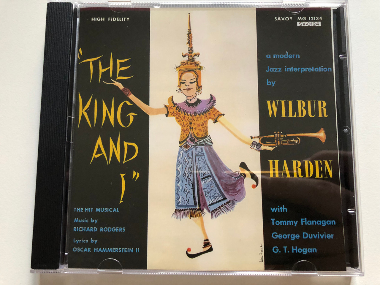https://cdn10.bigcommerce.com/s-62bdpkt7pb/products/0/images/264615/Wilbur_Harden_The_King_And_I_with_Tommy_Flanagan_George_Duvivier_G._T._Hogan_The_Hit_Musical_Music_By_Richard_Rodgers_Lyrics_by_Oscar_Hammerstein_II_Denon_Audio_CD_1991_SV-0124_1__51435.1674463888.1280.1280.JPG?c=2&_gl=1*11ua5av*_ga*MjA2NTIxMjE2MC4xNTkwNTEyNTMy*_ga_WS2VZYPC6G*MTY3NDQ1NjkwMy43MjUuMS4xNjc0NDYzODg2LjYwLjAuMA..