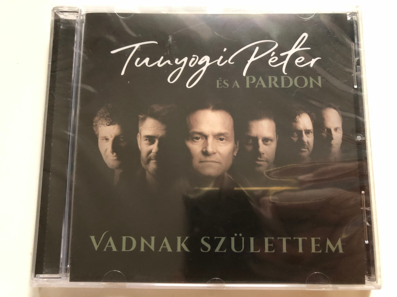 https://cdn10.bigcommerce.com/s-62bdpkt7pb/products/0/images/264687/Tunyogi_Pter_s_a_Pardon_Vadnak_Szlettem_GrundRecords_Audio_CD_2021_GR188_1__88770.1674540953.1280.1280.JPG?c=2&_gl=1*18fxckg*_ga*MjA2NTIxMjE2MC4xNTkwNTEyNTMy*_ga_WS2VZYPC6G*MTY3NDUzNDI1MC43MjYuMS4xNjc0NTQwOTY0LjYwLjAuMA..