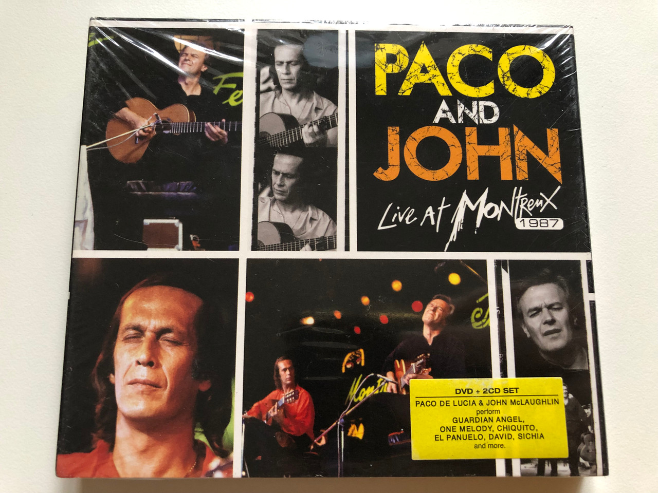 https://cdn10.bigcommerce.com/s-62bdpkt7pb/products/0/images/264751/Paco_And_John_Live_At_Montreux_1987_Paco_De_Lucia_John_McLaughlin_perform_Guardian_Angel_One_Melody_Chiquito_El_Panuelo_David_Sichia_and_more_Eagle_Vision_2x_Audio_CD_DVD_Video_CD_1__23354.1674627158.1280.1280.JPG?c=2&_gl=1*jrjhx4*_ga*MjA2NTIxMjE2MC4xNTkwNTEyNTMy*_ga_WS2VZYPC6G*MTY3NDYyNDEyOC43MjkuMS4xNjc0NjI2OTE0LjQxLjAuMA..