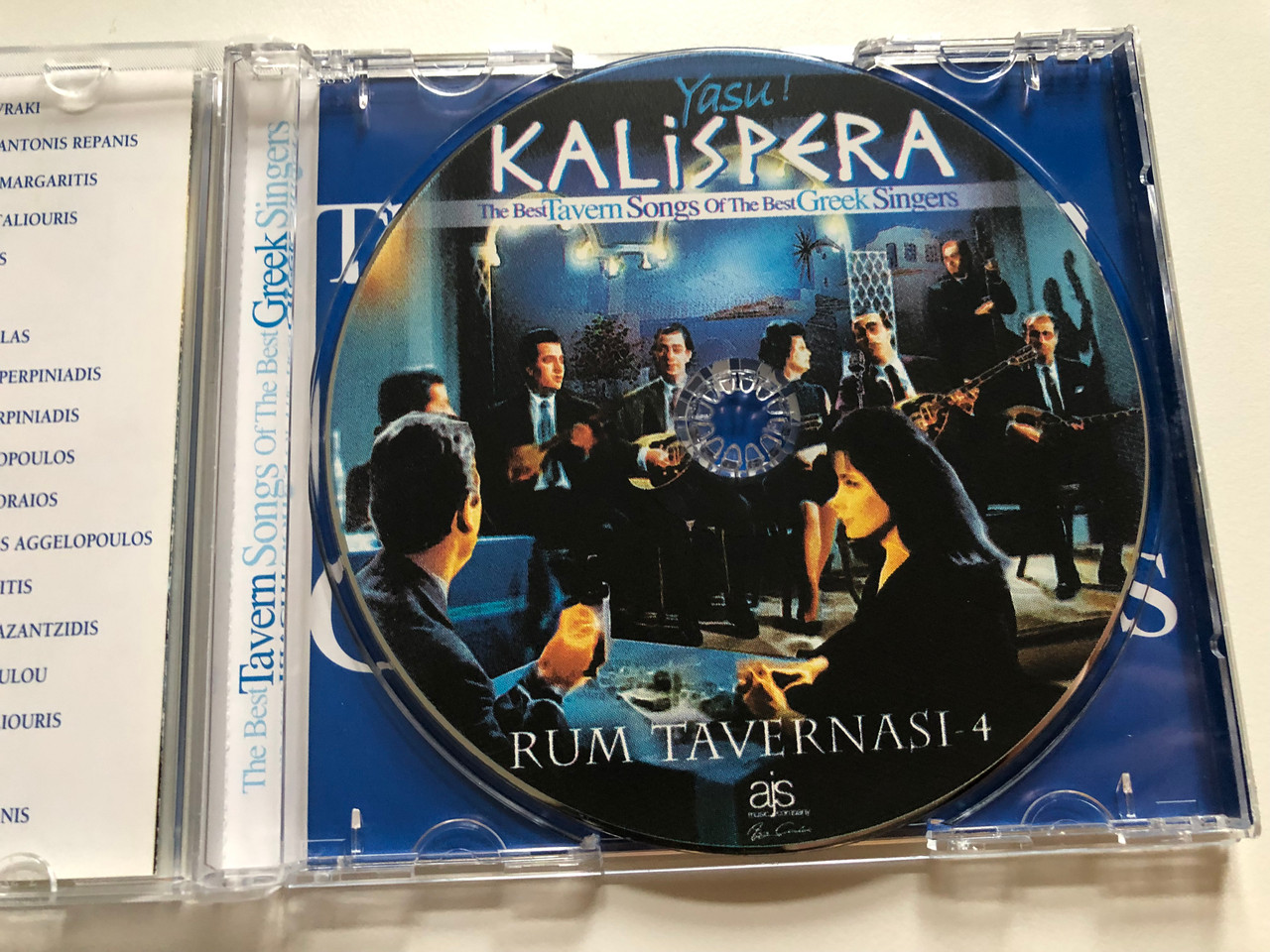 https://cdn10.bigcommerce.com/s-62bdpkt7pb/products/0/images/264752/Yasu_Kalispera_-_The_Best_Tavern_Songs_Of_The_Best_Greek_Singers_Rum_Tavernasi_-_4_Manolis_Agelopoulos_Panos_Gavalas_Giorgos_Taliouris_Vangelis_Perpiniadis_Giorgos_Margaritis_ajs_Mu_3__95008.1674628530.1280.1280.JPG?c=2&_gl=1*blqjss*_ga*MjA2NTIxMjE2MC4xNTkwNTEyNTMy*_ga_WS2VZYPC6G*MTY3NDYyNDEyOC43MjkuMS4xNjc0NjI3NjExLjQ0LjAuMA..