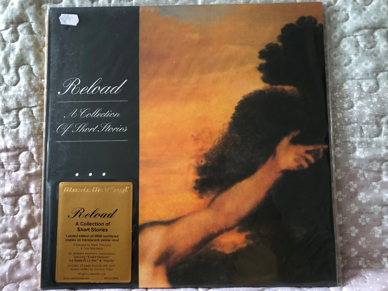 https://cdn10.bigcommerce.com/s-62bdpkt7pb/products/0/images/264828/Reload_A_Collection_Of_Short_Stories_A_Collection_Of_Short_Stories_Limited_edition_of_2000_numbered_copies_on_translucent_yellow_vinyl_Produced_by_Mark_Pritchard_Tom_Middleton_Music_O_1__83931.1674709003.1280.1280.JPG?c=2&_gl=1*ndvl67*_ga*MjA2NTIxMjE2MC4xNTkwNTEyNTMy*_ga_WS2VZYPC6G*MTY3NDcwNzU2MS43MzEuMS4xNjc0NzA4Njg3LjQ5LjAuMA..