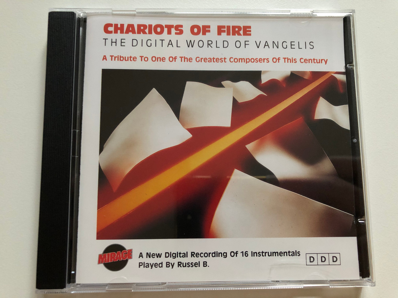https://cdn10.bigcommerce.com/s-62bdpkt7pb/products/0/images/264870/Chariots_Of_Fire_The_Digital_World_Of_Vangelis_A_Tribute_To_One_Of_The_Greatest_Composers_Of_This_Century_A_New_Digital_Recording_Of_16_Instrumentals_Played_By_Russel_B._Mirage_Audio_CD_1__28262.1674712405.1280.1280.JPG?c=2&_gl=1*1fy0b7y*_ga*MjA2NTIxMjE2MC4xNTkwNTEyNTMy*_ga_WS2VZYPC6G*MTY3NDcwNzU2MS43MzEuMS4xNjc0NzEyNDY5LjYwLjAuMA..