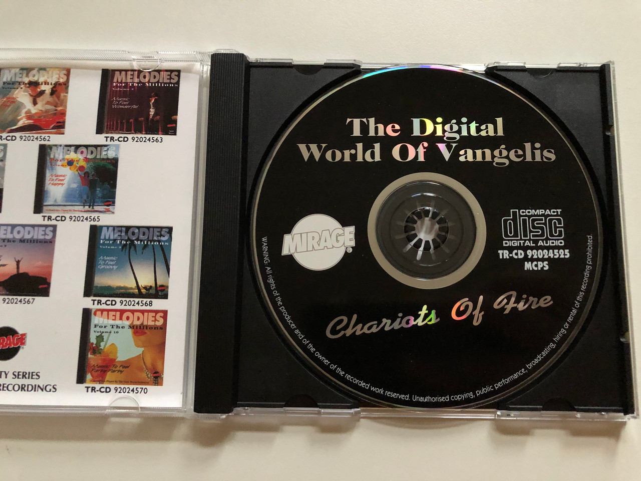 https://cdn10.bigcommerce.com/s-62bdpkt7pb/products/0/images/264873/Chariots_Of_Fire_The_Digital_World_Of_Vangelis_A_Tribute_To_One_Of_The_Greatest_Composers_Of_This_Century_A_New_Digital_Recording_Of_16_Instrumentals_Played_By_Russel_B._Mirage_Audio_CD__70572.1674712431.1280.1280.JPG?c=2&_gl=1*1fy0b7y*_ga*MjA2NTIxMjE2MC4xNTkwNTEyNTMy*_ga_WS2VZYPC6G*MTY3NDcwNzU2MS43MzEuMS4xNjc0NzEyNDY5LjYwLjAuMA..