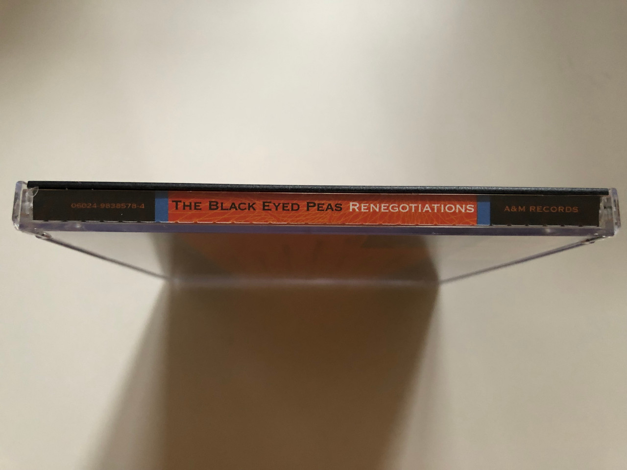 https://cdn10.bigcommerce.com/s-62bdpkt7pb/products/0/images/264964/The_Black_Eyed_Peas_Renegotiations_The_Remixes_AM_Records_Audio_CD_2006_06024-9838578-4_3__17851.1674802398.1280.1280.JPG?c=2&_gl=1*q6drtx*_ga*MjA2NTIxMjE2MC4xNTkwNTEyNTMy*_ga_WS2VZYPC6G*MTY3NDgwMDkyOC43MzMuMS4xNjc0ODAyMjAyLjM5LjAuMA..