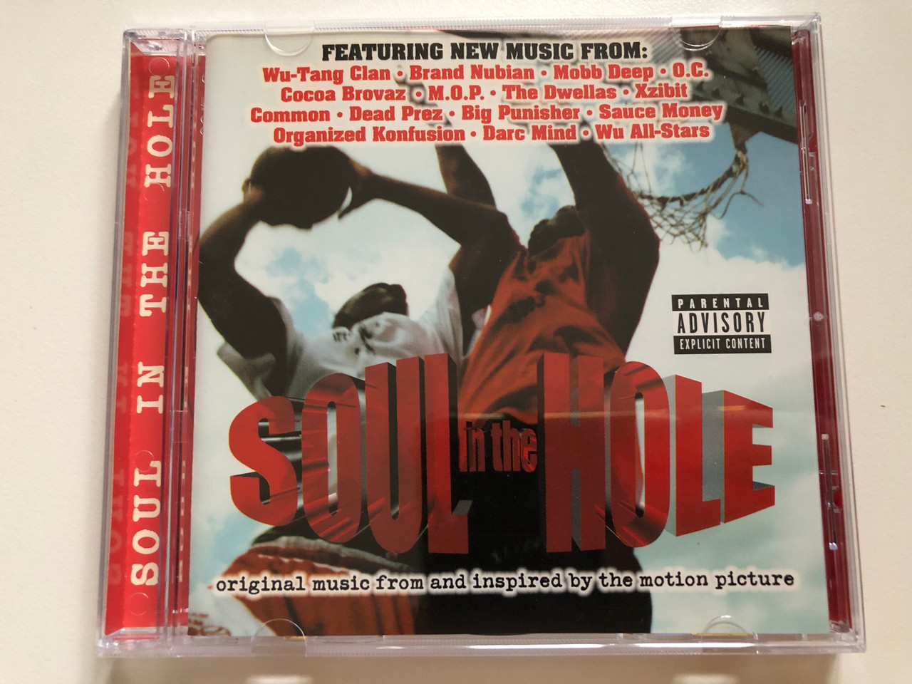 https://cdn10.bigcommerce.com/s-62bdpkt7pb/products/0/images/265006/Soul_In_The_Hole_-_Featuring_New_Music_From_Wu-Tang_Clan_Brand_Nubian_Mobb_Deep_O._C._Cocoa_Brovaz_M._O._P._The_Dwellas_Xzibit_Common_Dead_Prez_Big_Punisher_Sauce_Money_RCA_Audio_1__91653.1674807560.1280.1280.JPG?c=2&_gl=1*1nhs4pg*_ga*MjA2NTIxMjE2MC4xNTkwNTEyNTMy*_ga_WS2VZYPC6G*MTY3NDgwMDkyOC43MzMuMS4xNjc0ODA3NTI2LjYwLjAuMA..