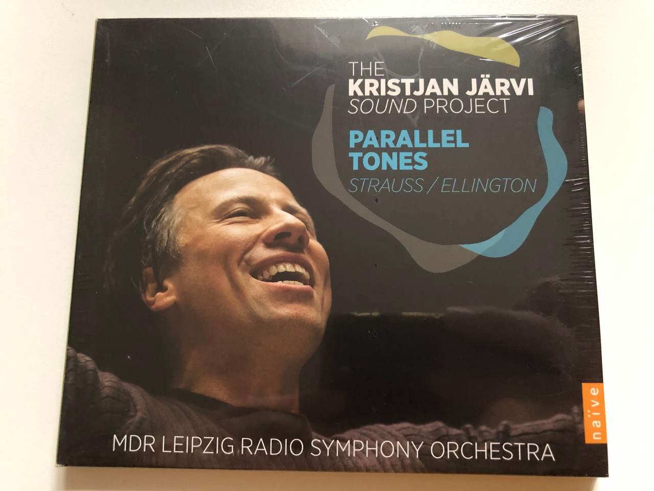 https://cdn10.bigcommerce.com/s-62bdpkt7pb/products/0/images/265093/The_Kirstjan_Jarvi_Sound_Project_Parallel_Tones_-_Straussllington_MDR_Leipzig_Radio_Symphony_Orchestra_Nave_Audio_CD_2014_V_5404_1__25790.1674814849.1280.1280.JPG?c=2&_gl=1*173z24w*_ga*MjA2NTIxMjE2MC4xNTkwNTEyNTMy*_ga_WS2VZYPC6G*MTY3NDgwMDkyOC43MzMuMS4xNjc0ODE0NzE5LjQzLjAuMA..