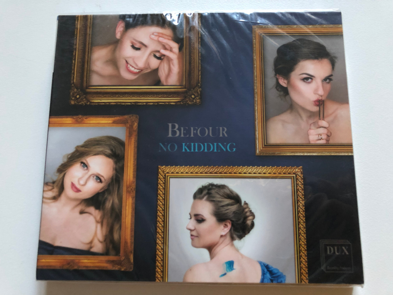 https://cdn10.bigcommerce.com/s-62bdpkt7pb/products/0/images/265149/Be_Four_-_No_Kidding_DUX_Recording_Audio_CD_2019_DUX_1461_1__06522.1675069595.1280.1280.JPG?c=2&_gl=1*f8bvs7*_ga*MjA2NTIxMjE2MC4xNTkwNTEyNTMy*_ga_WS2VZYPC6G*MTY3NTA2NDAxMC43MzQuMS4xNjc1MDY5MTg3LjQ2LjAuMA..