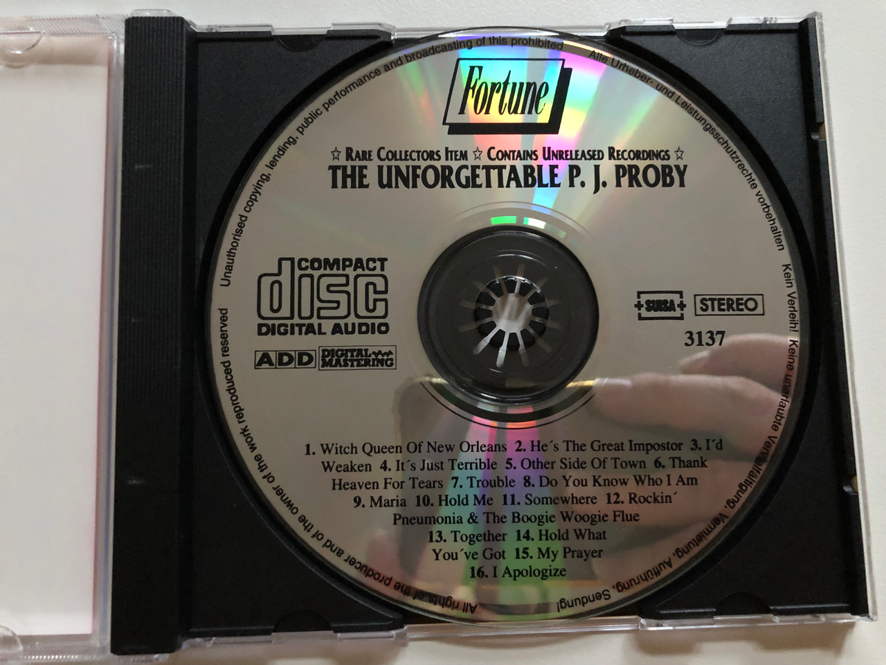 https://cdn10.bigcommerce.com/s-62bdpkt7pb/products/0/images/265172/The_Unforgettable_P._J._Proby_-_Rare_Collectors_Item_Contains_Unreleased_Recordings_Witch_Queen_Of_New_Orleans_My_Prayer_Hold_Me_Somewhere_Together_Rockin_Pneumonia_The_Boogie_Woo__23463.1675077675.1280.1280.JPG?c=2&_gl=1*12z9pro*_ga*MjA2NTIxMjE2MC4xNTkwNTEyNTMy*_ga_WS2VZYPC6G*MTY3NTA3NDkzMC43MzUuMS4xNjc1MDc3Mjg2LjE4LjAuMA..
