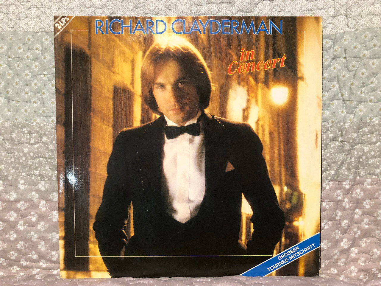 https://cdn10.bigcommerce.com/s-62bdpkt7pb/products/0/images/265688/Richard_Clayderman_In_Concert_TELDEC_2x_LP_1982_6_1__92647.1675676316.1280.1280.JPG?c=2&_gl=1*e2ok1v*_ga*MjA2NTIxMjE2MC4xNTkwNTEyNTMy*_ga_WS2VZYPC6G*MTY3NTY2NTgzOS43NDUuMS4xNjc1Njc2MjA4LjUyLjAuMA..