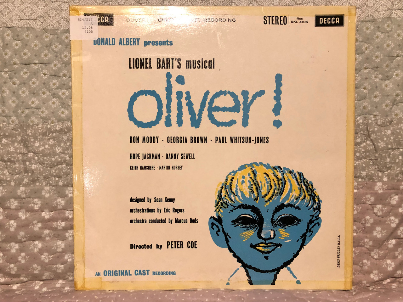 https://cdn10.bigcommerce.com/s-62bdpkt7pb/products/0/images/265737/Donald_Albery_presents_-_Lionel_Barts_musical_Oliver_Ron_Moody_Georgia_Brown_Paul_Whitsun-Jones_Hope_Jackman_Danny_Sewell_Keith_Hamshere_Martin_Horsey_Designed_by_Sean_Kenny_Decca_L_1__32929.1675754095.1280.1280.JPG?c=2&_gl=1*17zrt4k*_ga*MjA2NTIxMjE2MC4xNTkwNTEyNTMy*_ga_WS2VZYPC6G*MTY3NTc0Nzc1NS43NDcuMS4xNjc1NzUzNzc2LjUuMC4w