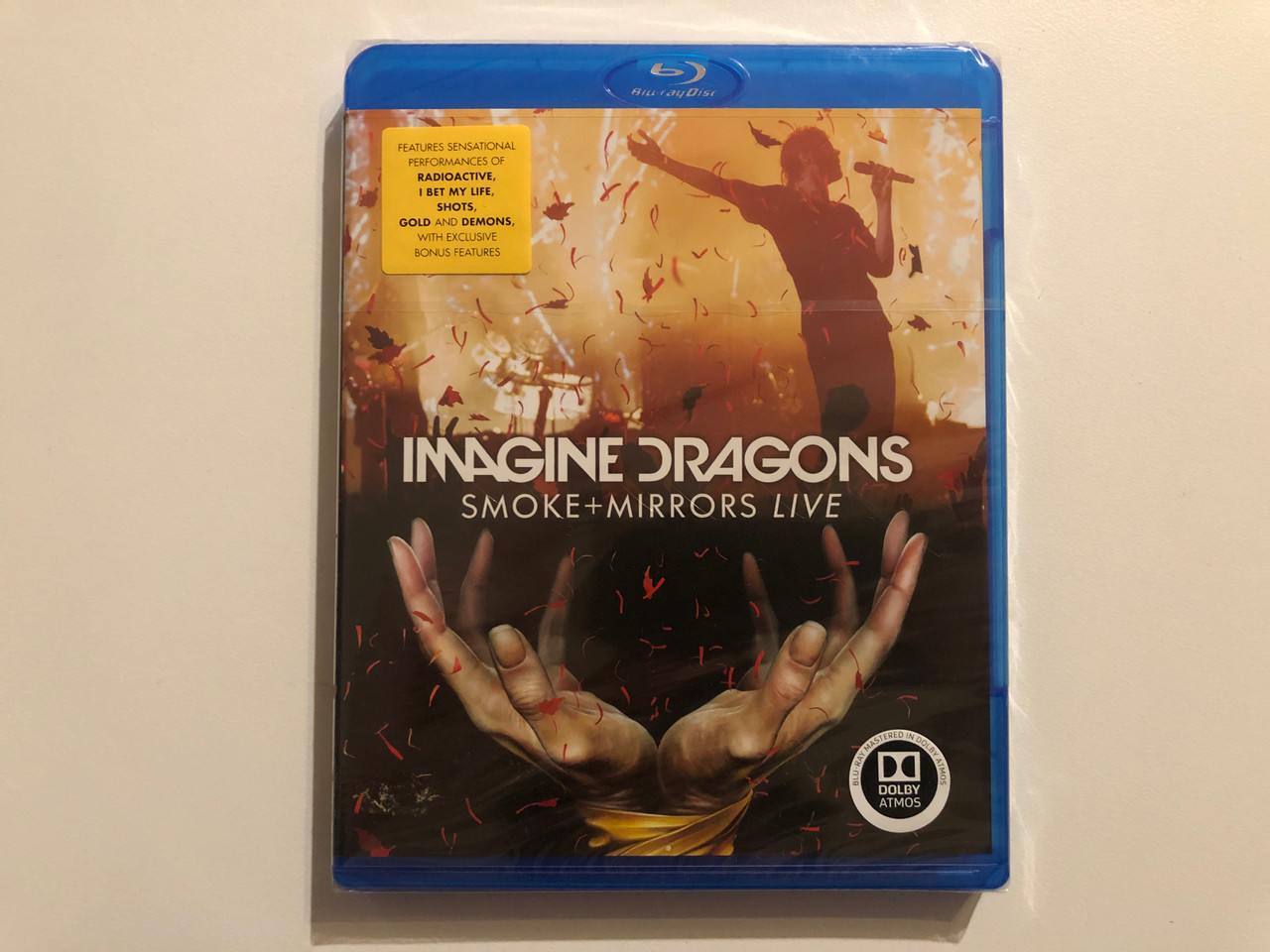 https://cdn10.bigcommerce.com/s-62bdpkt7pb/products/0/images/265763/Imagine_Dragons_Smoke_Mirrors_Live_DVD_5051300528874_1__90774.1675793590.1280.1280.JPG?c=2&_gl=1*2t8vzc*_ga*MjAyOTE0ODY1OS4xNTkyNDY2ODc5*_ga_WS2VZYPC6G*MTY3NTc4NzQ5NC4yNzkzLjEuMTY3NTc5Mjc5Ny41Mi4wLjA.