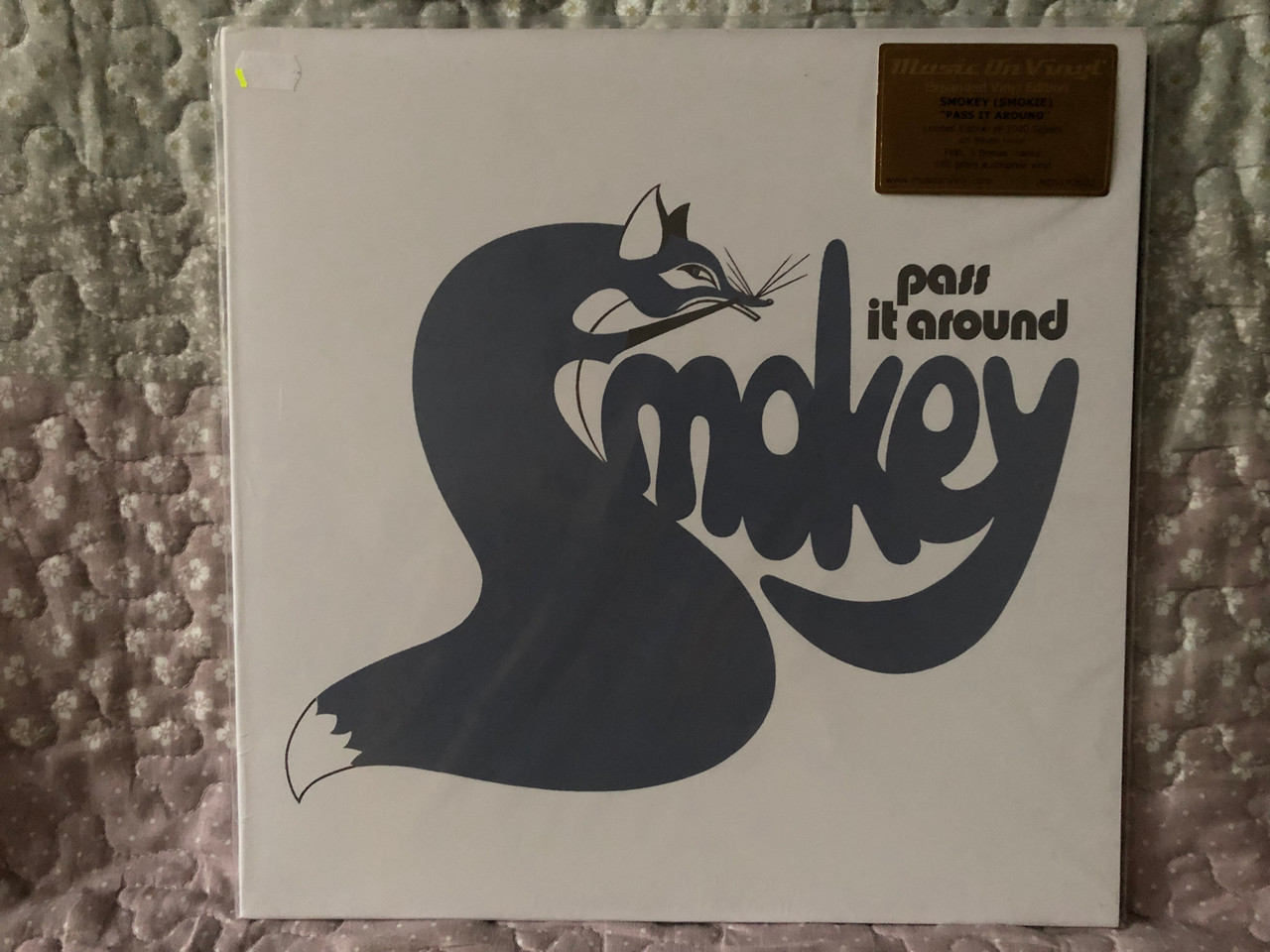 https://cdn10.bigcommerce.com/s-62bdpkt7pb/products/0/images/265813/Smokey_Pass_It_Around_Music_On_Vinyl_LP_2020_MOVLP2622_1__66536.1675848748.1280.1280.JPG?c=2&_gl=1*1w245g6*_ga*MjA2NTIxMjE2MC4xNTkwNTEyNTMy*_ga_WS2VZYPC6G*MTY3NTgzOTgzMy43NTIuMS4xNjc1ODQ4MzEyLjQ5LjAuMA..