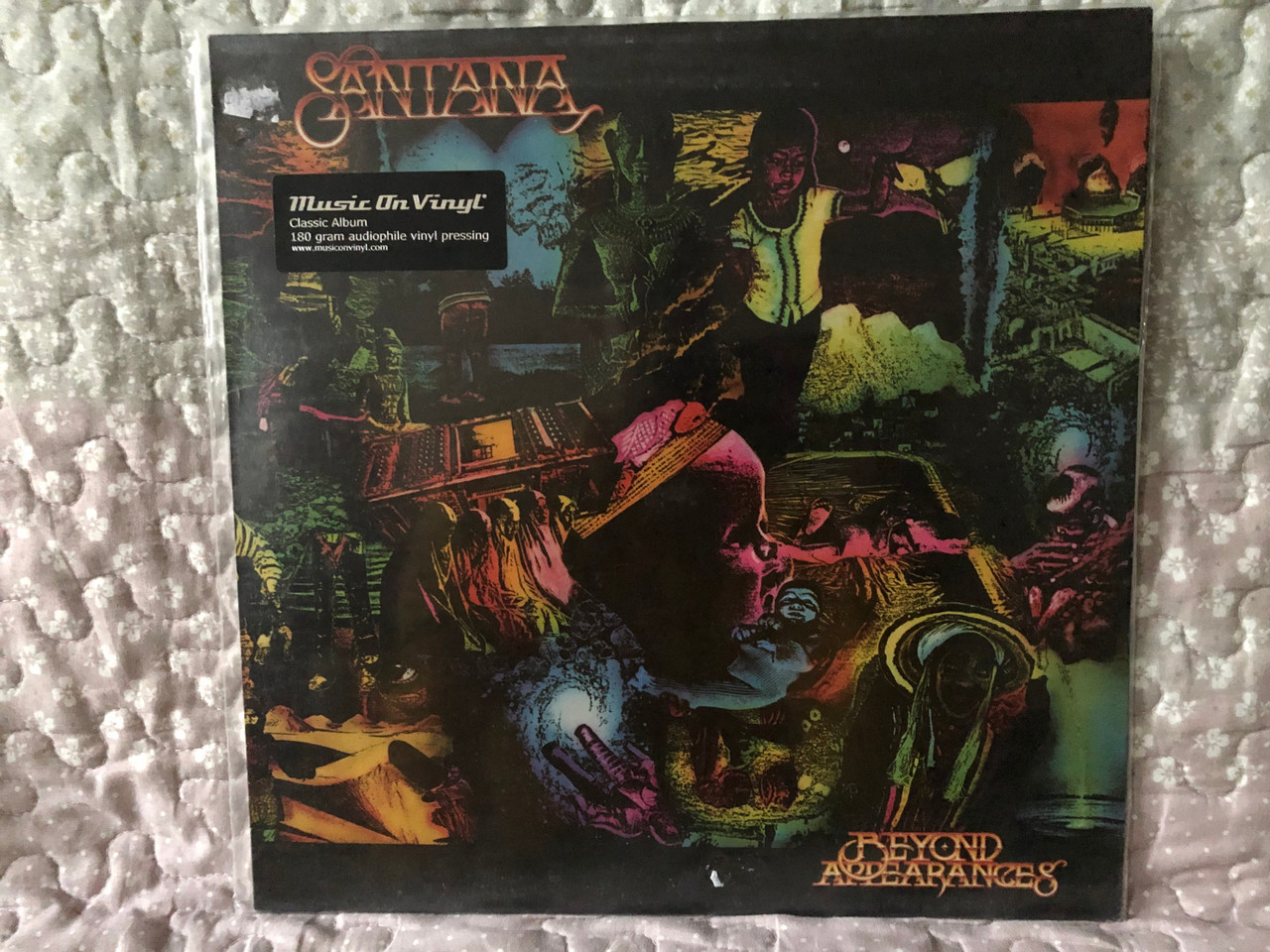 https://cdn10.bigcommerce.com/s-62bdpkt7pb/products/0/images/265819/Santana_Beyond_Appearances_Music_On_Vinyl_LP_2019_MOVLP2369_1__72675.1675849569.1280.1280.JPG?c=2&_gl=1*vx98dj*_ga*MjA2NTIxMjE2MC4xNTkwNTEyNTMy*_ga_WS2VZYPC6G*MTY3NTgzOTgzMy43NTIuMS4xNjc1ODQ5NjE1LjkuMC4w