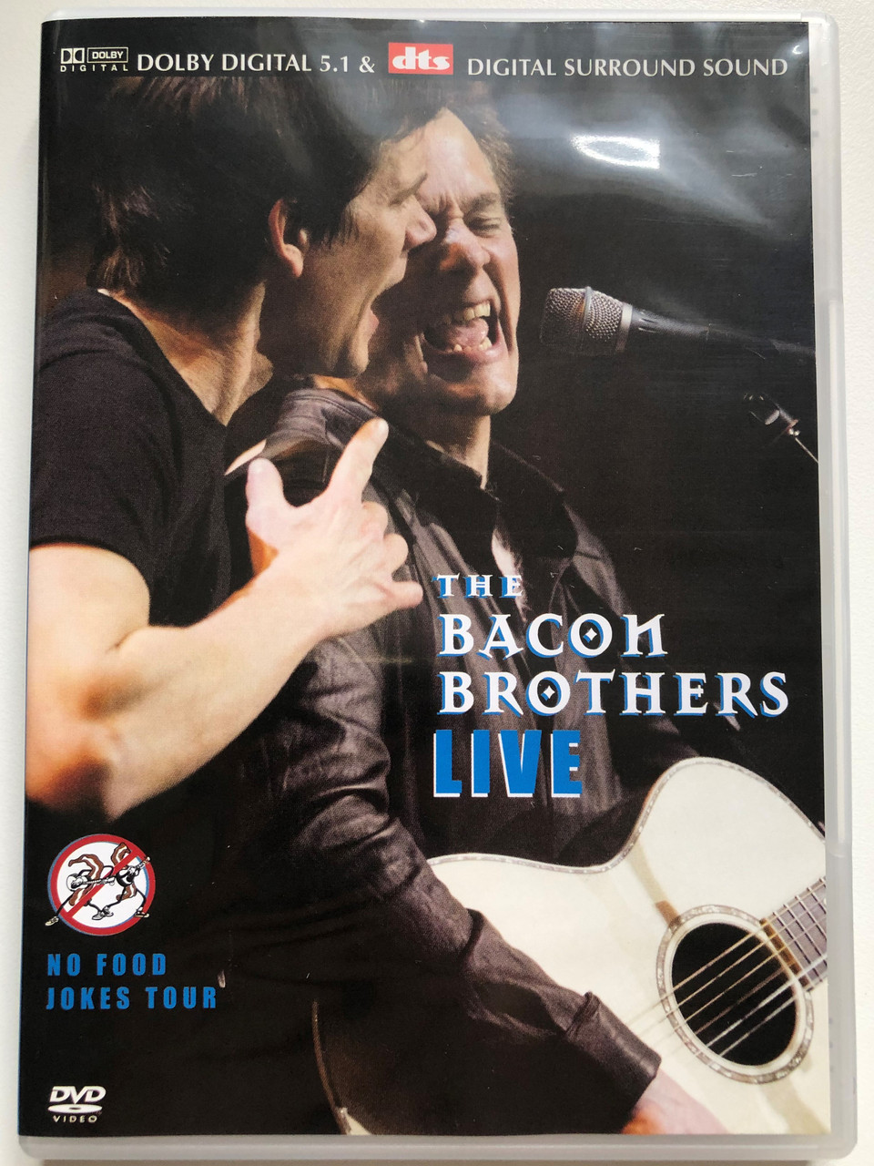 https://cdn10.bigcommerce.com/s-62bdpkt7pb/products/0/images/266274/The_Bacon_Brothers_Live_-_No_Food_Jokes_Tour_DVD_828765552097_1__96850.1676198626.1280.1280.JPG?c=2&_gl=1*v9557k*_ga*MjAyOTE0ODY1OS4xNTkyNDY2ODc5*_ga_WS2VZYPC6G*MTY3NjE5ODE2OC4yODI4LjEuMTY3NjE5ODYyNy42MC4wLjA.