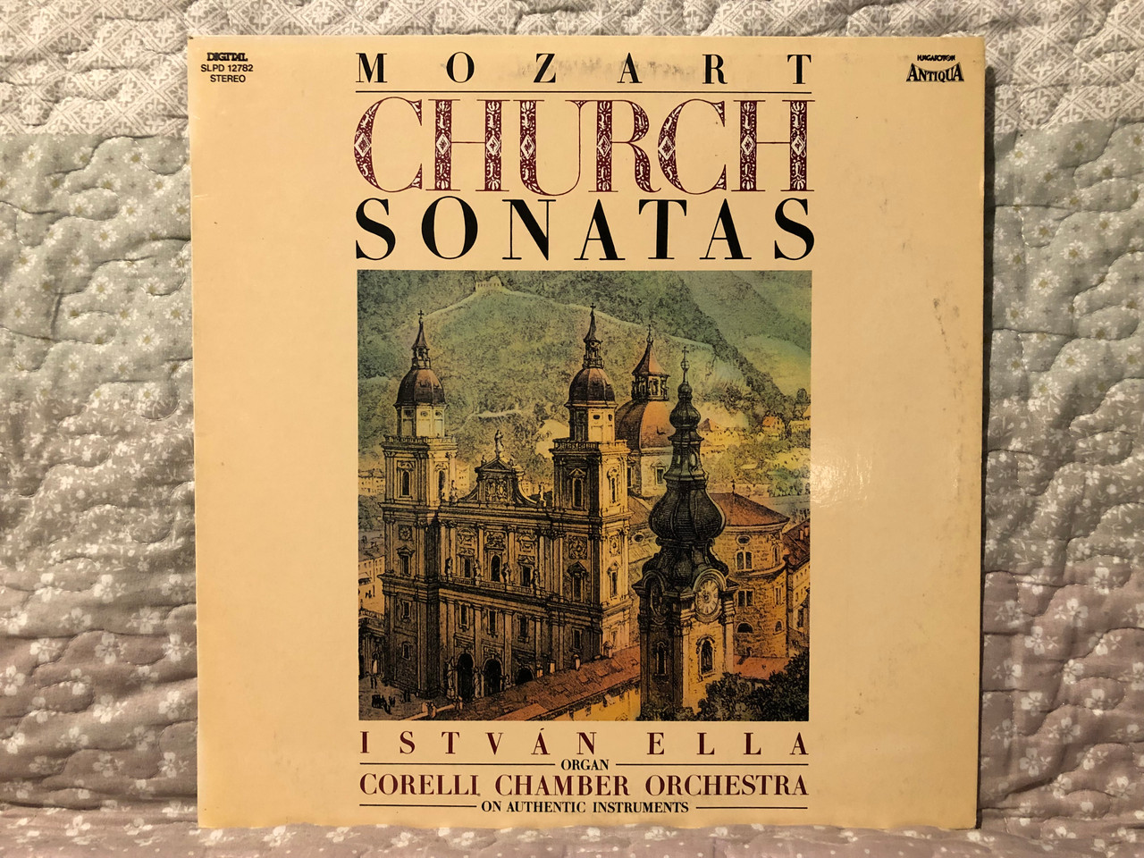 https://cdn10.bigcommerce.com/s-62bdpkt7pb/products/0/images/266572/Mozart_Church_Sonatas_-_Istvn_Ella_organ_Corelli_Chamber_Orchestra_On_Authentic_Instruments_Hungaroton_Antiqua_LP_1987_Stereo_SLPD_12782_1__15506.1676389932.1280.1280.JPG?c=2&_gl=1*i9lfag*_ga*MjA2NTIxMjE2MC4xNTkwNTEyNTMy*_ga_WS2VZYPC6G*MTY3NjM4NjA5Ny43NTguMS4xNjc2Mzg5OTcxLjE1LjAuMA..
