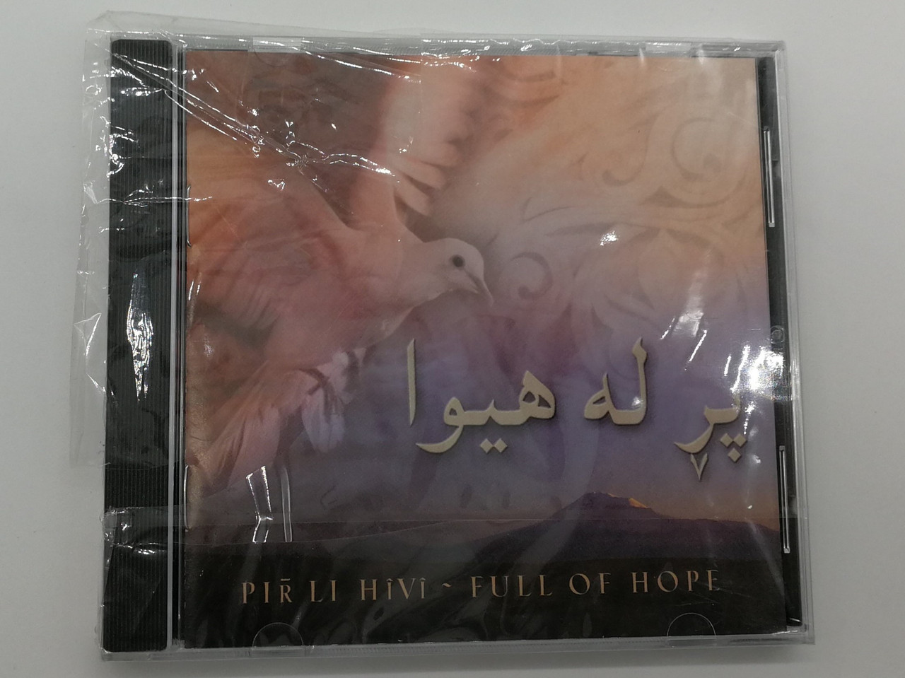 https://cdn10.bigcommerce.com/s-62bdpkt7pb/products/0/images/268011/Pir_Li_Hivi_-_Full_Of_Hope_-_Pir_Li_Hivi_Music_Audio_CD_2002_SGD0001_1__94709.1677496828.1280.1280.jpg?c=2&_gl=1*co21lz*_ga*MjA2NTIxMjE2MC4xNTkwNTEyNTMy*_ga_WS2VZYPC6G*MTY3NzQ5MzM0OS43NzYuMS4xNjc3NDk1ODcxLjUxLjAuMA..
