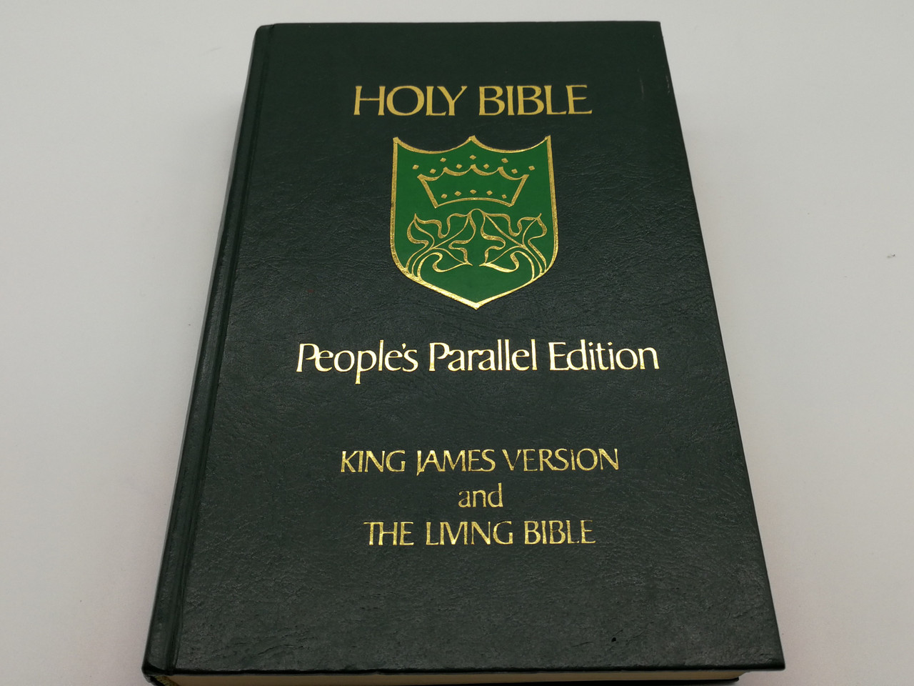 https://cdn10.bigcommerce.com/s-62bdpkt7pb/products/0/images/268259/Holy_Bible_Peoples_Parallel_Edition_-_King_James_Version_and_the_Living_Bible_Tyndale_House_Publishers_1985_Hardcover_Mid_Size_1__49564.1677687166.1280.1280.jpg?c=2&_gl=1*11vr4mp*_ga*MjA2NTIxMjE2MC4xNTkwNTEyNTMy*_ga_WS2VZYPC6G*MTY3NzY4MTgzOC43ODMuMS4xNjc3Njg3MTE3LjYwLjAuMA..