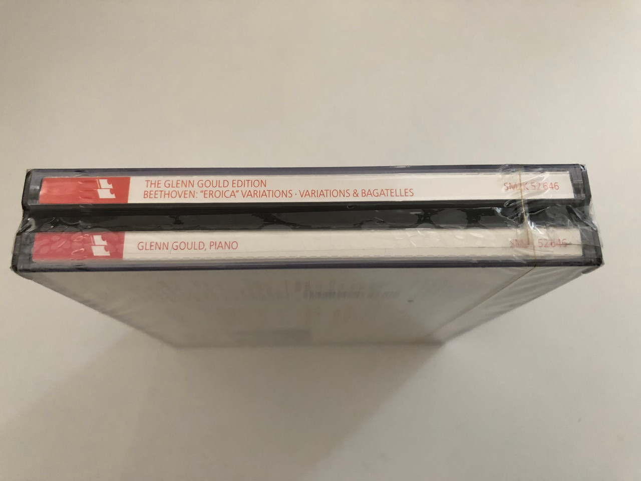 https://cdn10.bigcommerce.com/s-62bdpkt7pb/products/0/images/269070/The_Glenn_Gould_Edition_Beethoven_Eroica_Variations_32_Variations_WoO_80_6_Variations_Op._34_Bagatelles_Op._33_Op._126_Sony_Classical_2x_Audio_CD_1992_SM2K_52646_3__20913.1678166016.1280.1280.JPG?c=2&_gl=1*9uw2fw*_ga*MjA2NTIxMjE2MC4xNTkwNTEyNTMy*_ga_WS2VZYPC6G*MTY3ODE2NDQ5OC43OTMuMS4xNjc4MTY1OTQxLjYwLjAuMA..